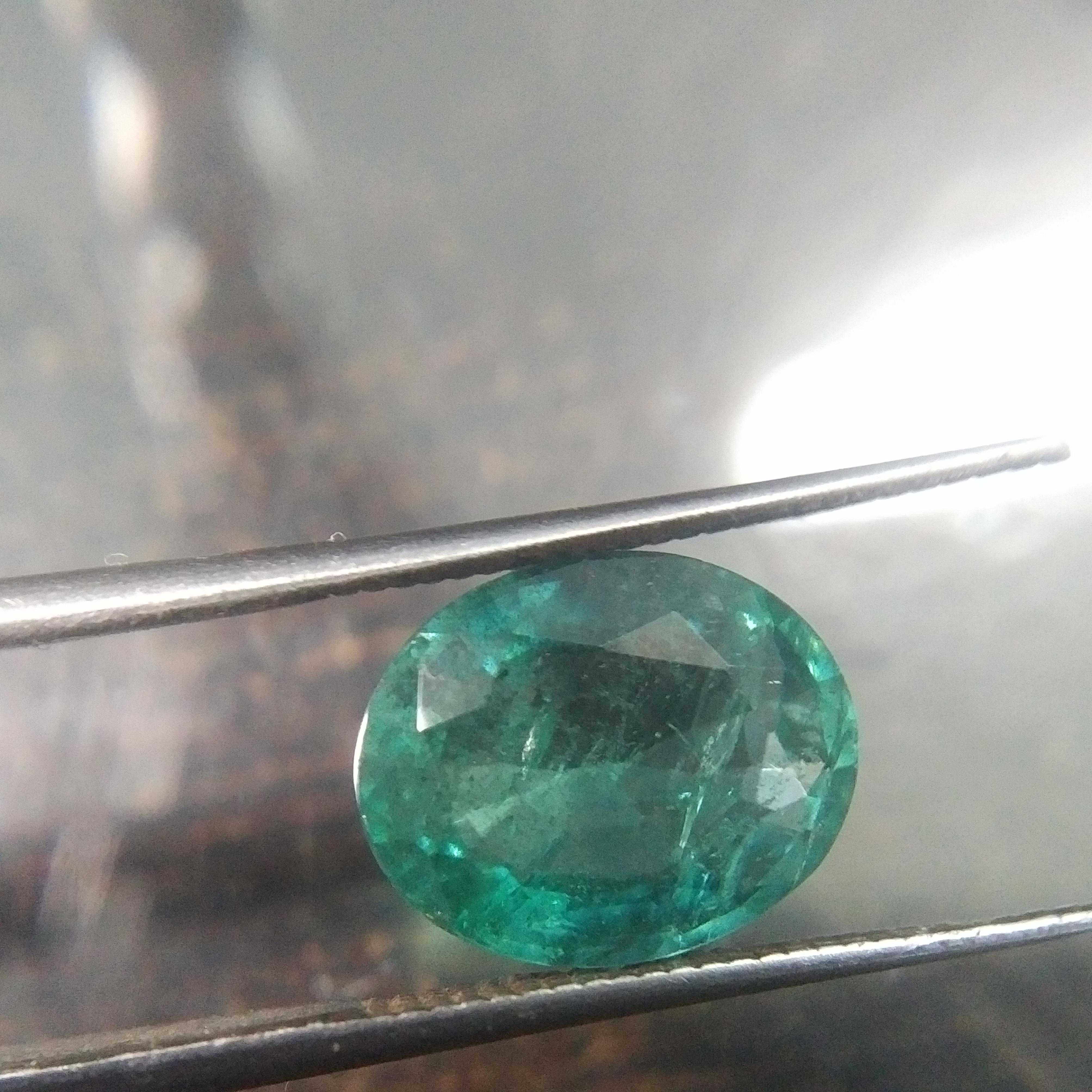 2.95ct certified bluish bright green oval Zambian emerald stone