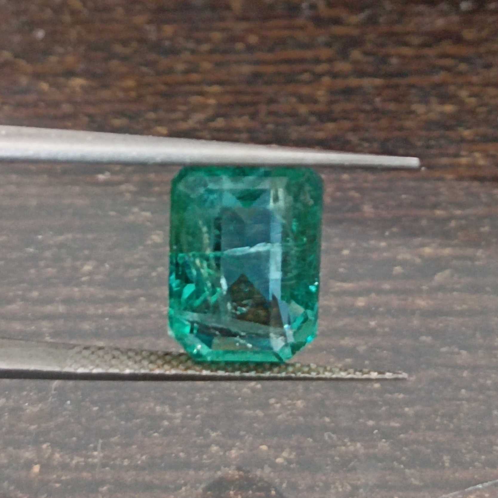 4.04ct GJEPC certified natural algae green emerald cut emerald stone