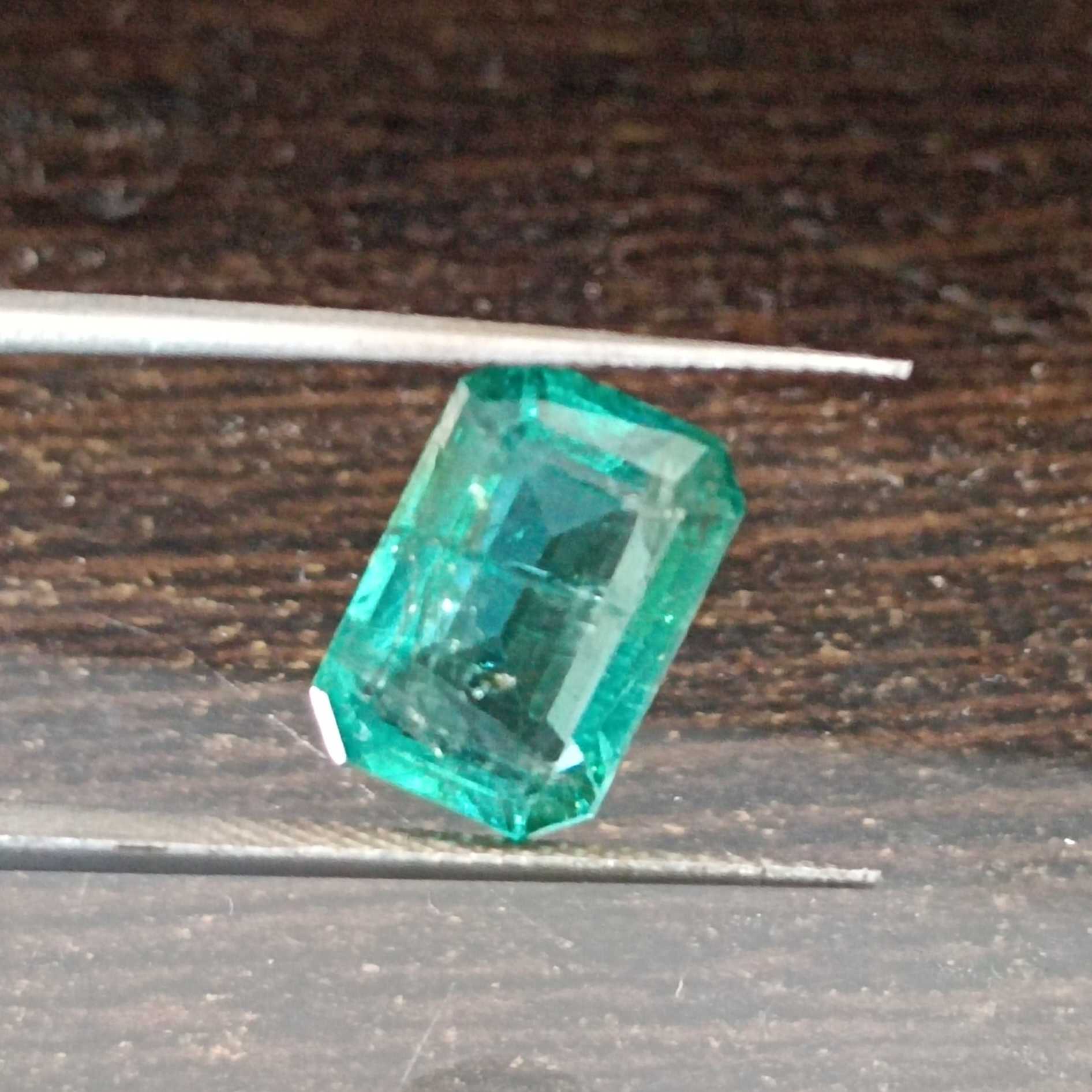 4.04ct GJEPC certified natural algae green emerald cut emerald stone