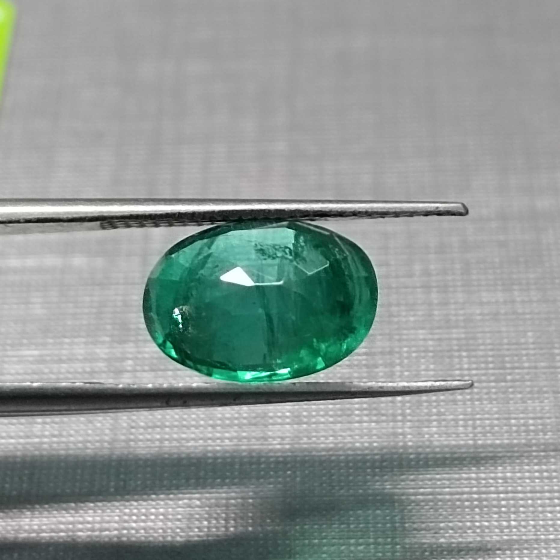 3.02ct GSI certified oval cut deep vivid green Pakistan emerald gem