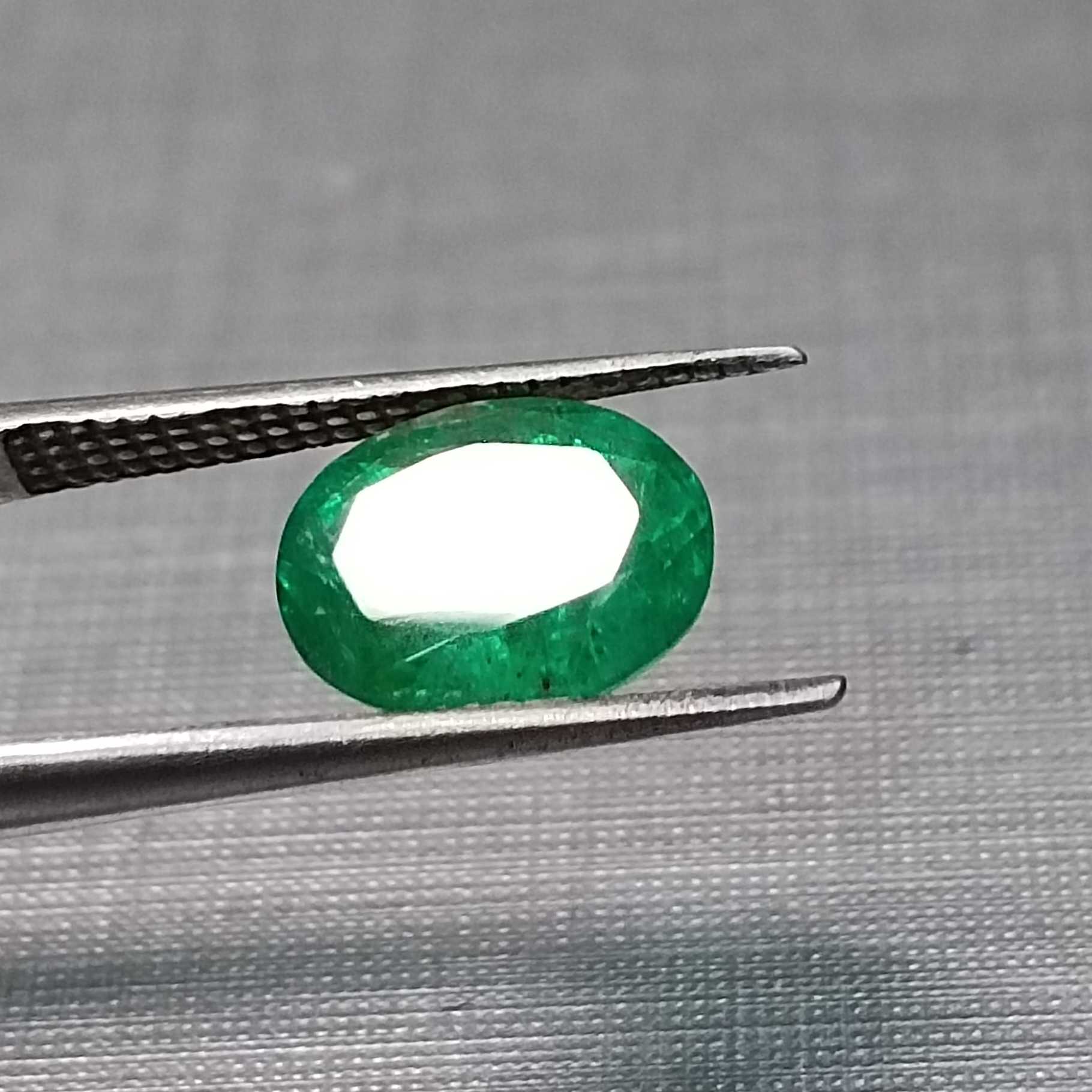 1.82ct deep vivid green oval cut emerald stone