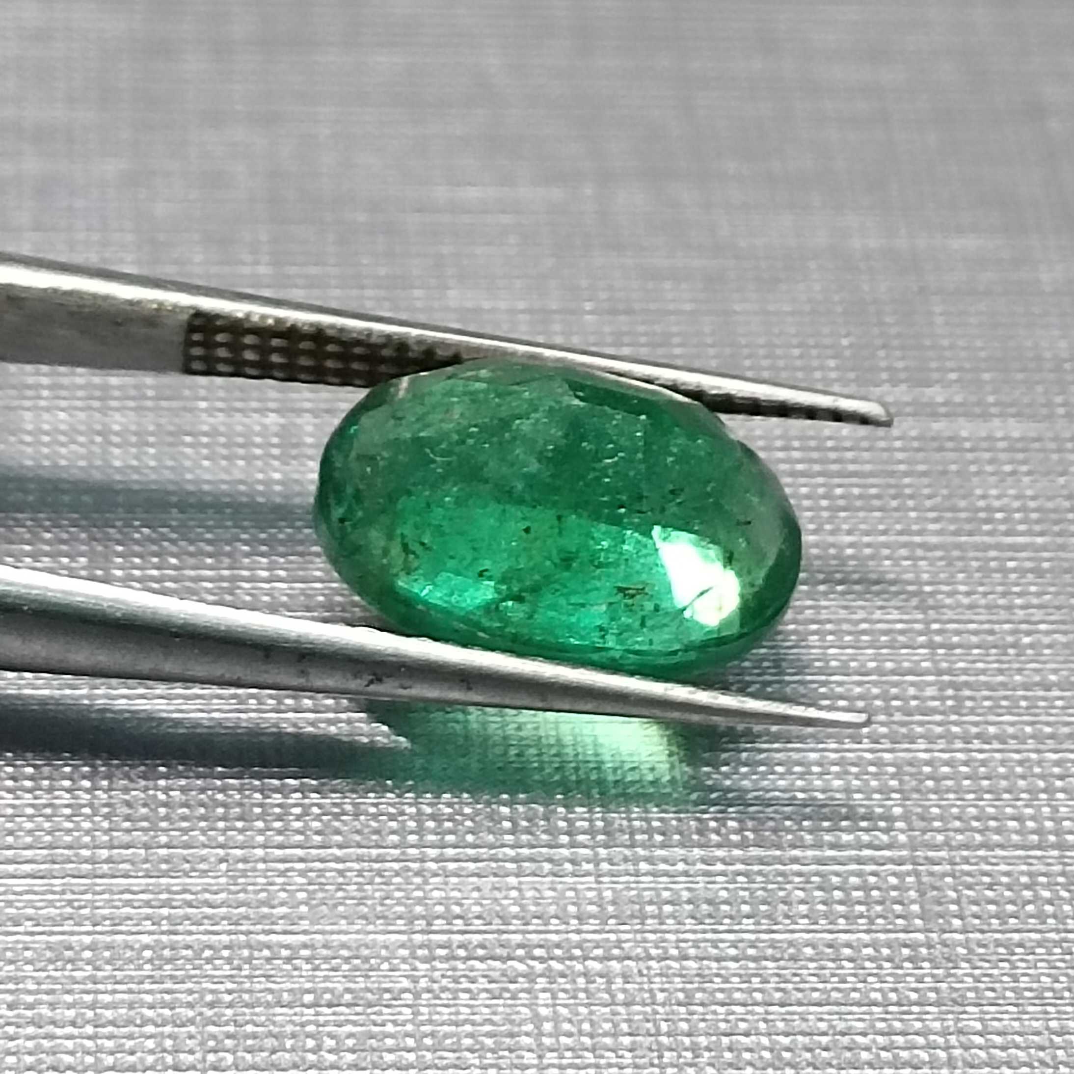 3.24ct GSI certified oval cut medium deep golden green emerald gem