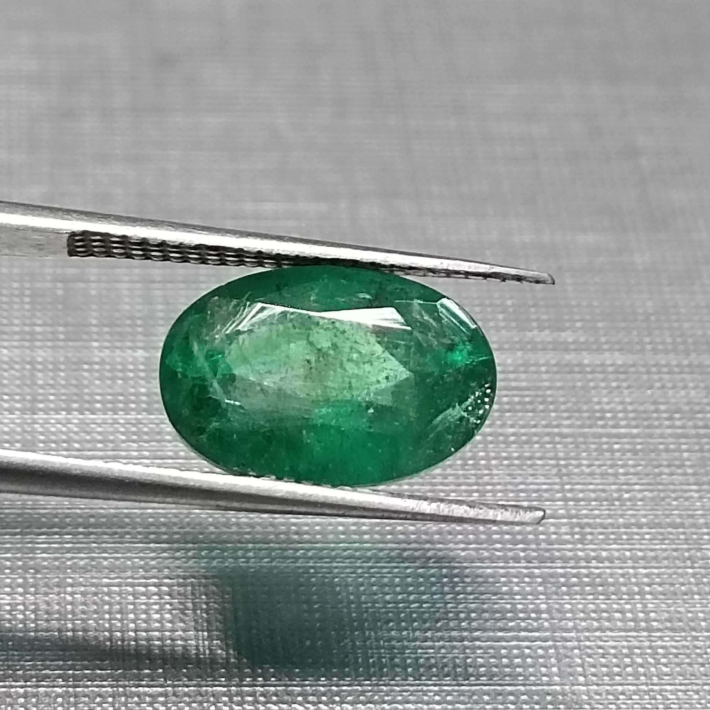 3.24ct GSI certified oval cut medium deep golden green emerald gem