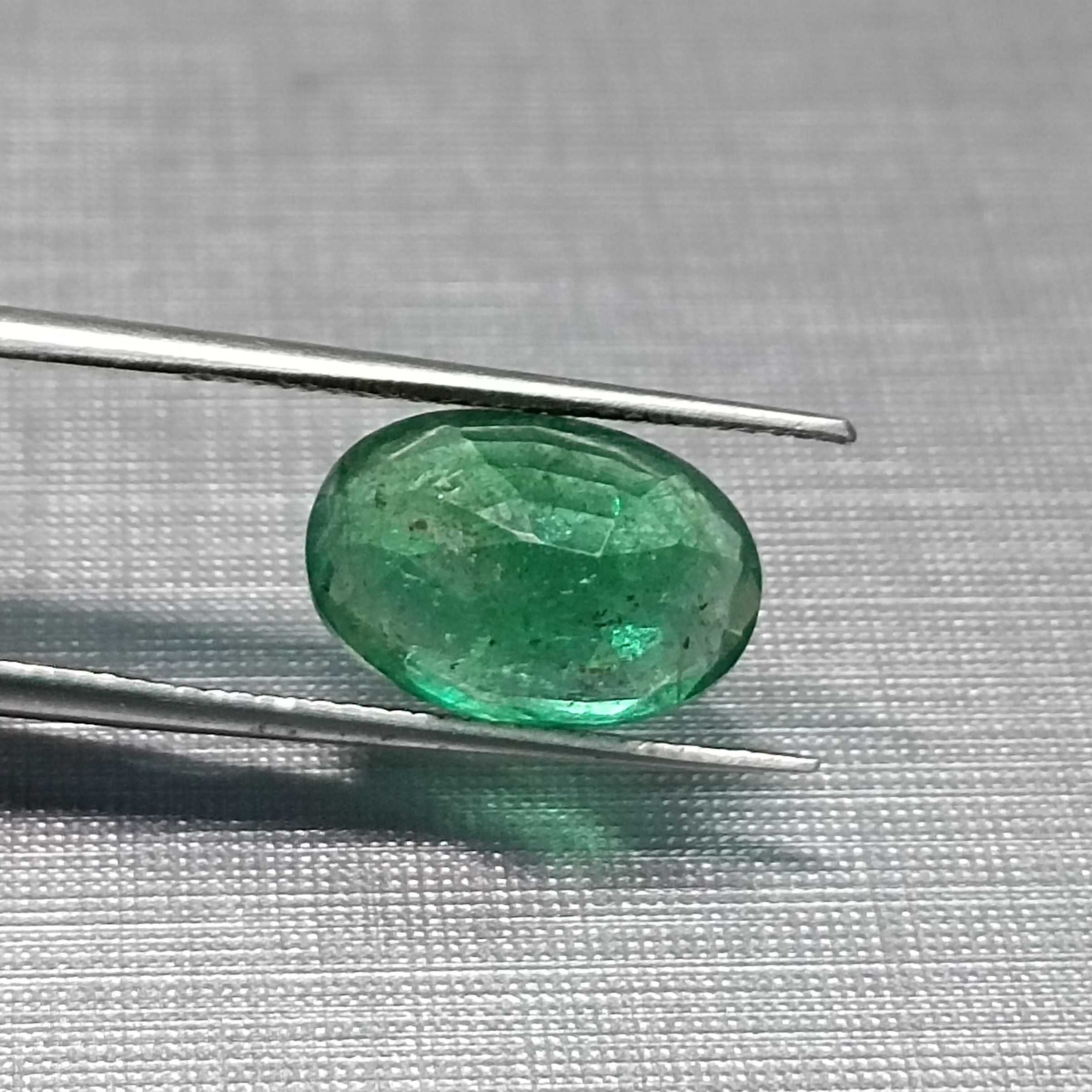 3.24ct GSI certified oval cut medium deep golden green emerald gem