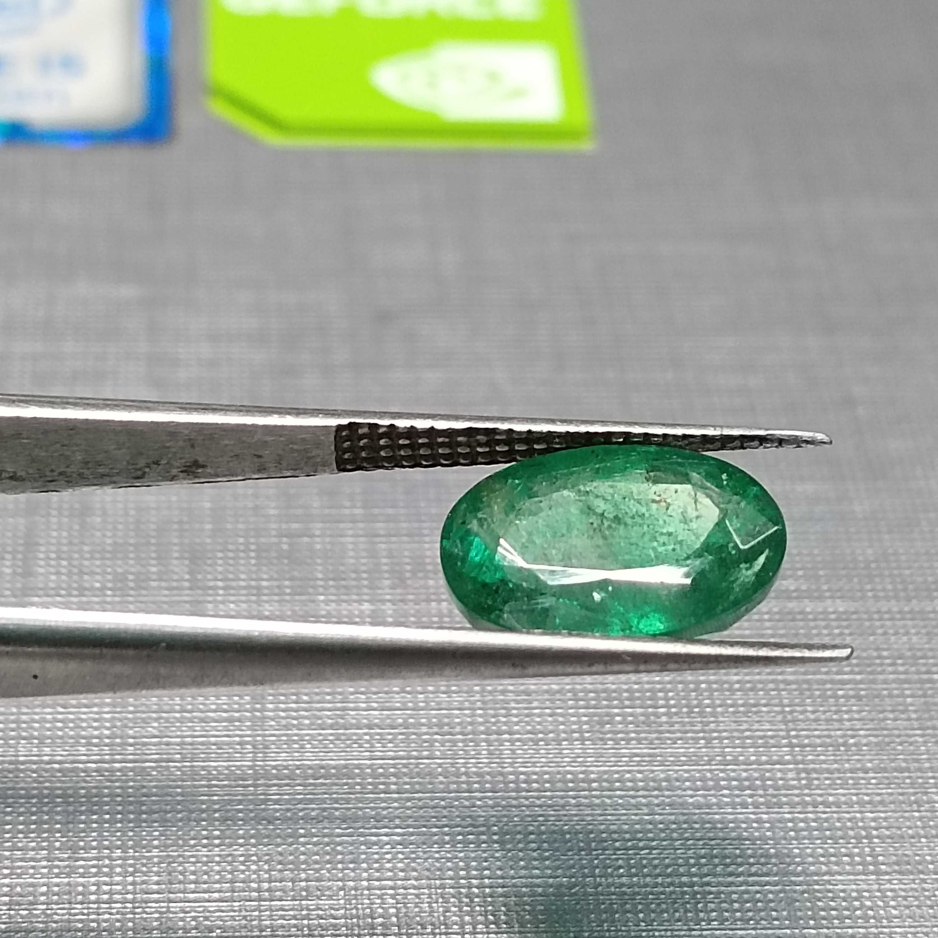 3.24ct GSI certified oval cut medium deep golden green emerald gem