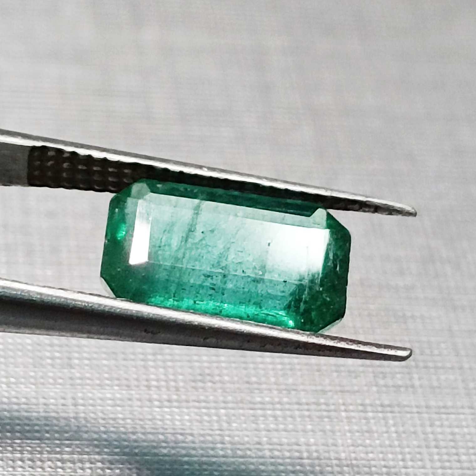 2.42ct deep medium green with blue tint octagon Zambian emerald