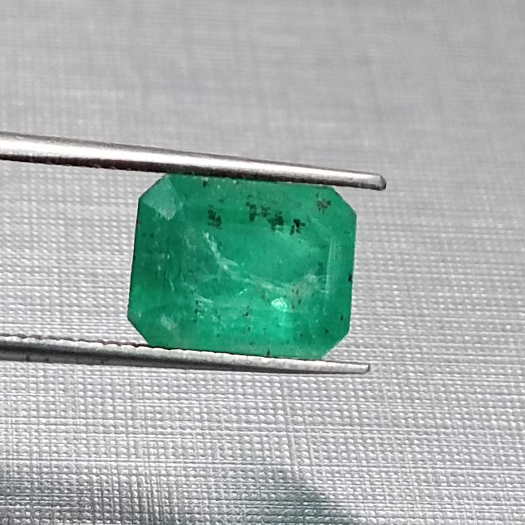 3.06ct GSI certified medium green emerald cut emerald stone