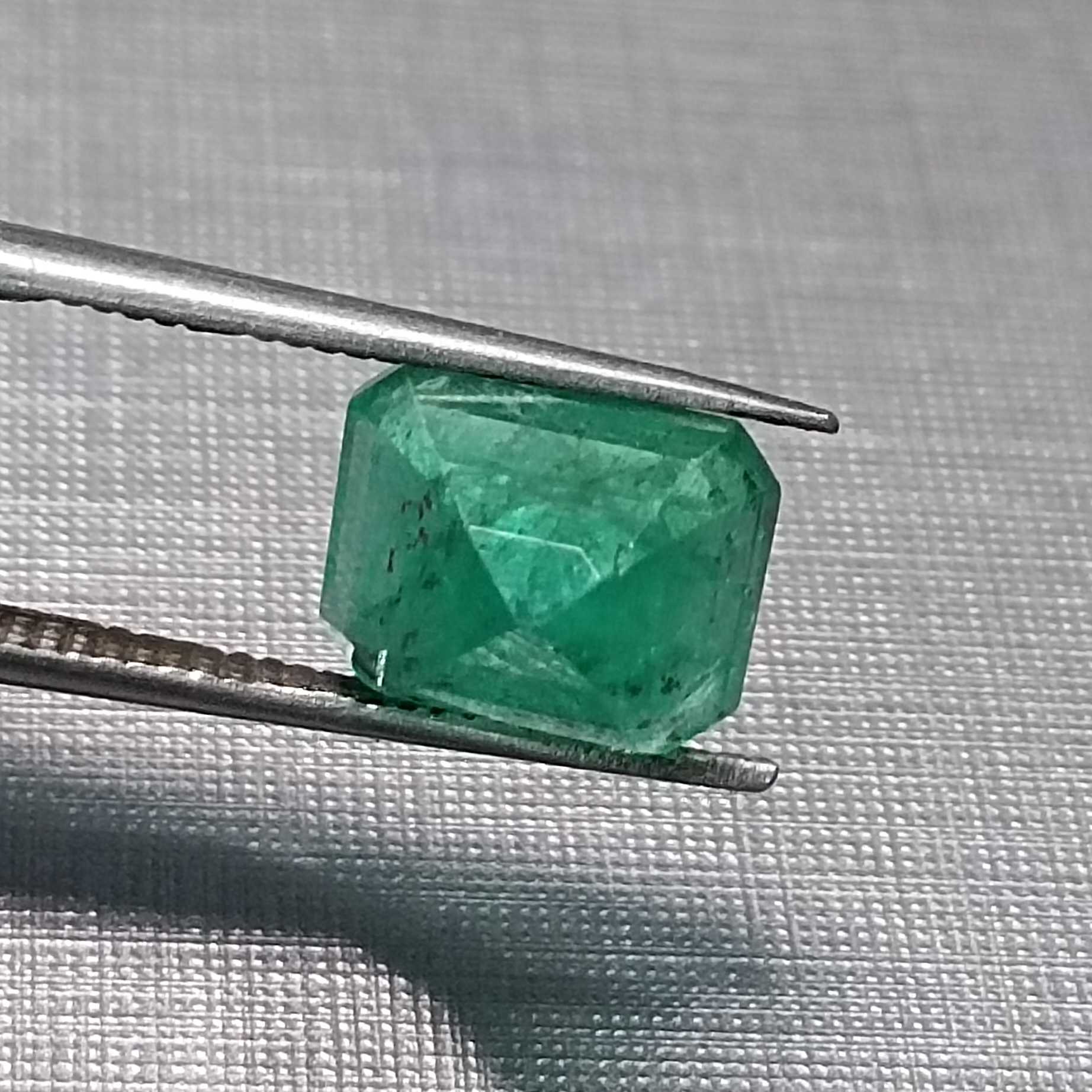 3.06ct GSI certified medium green emerald cut emerald stone