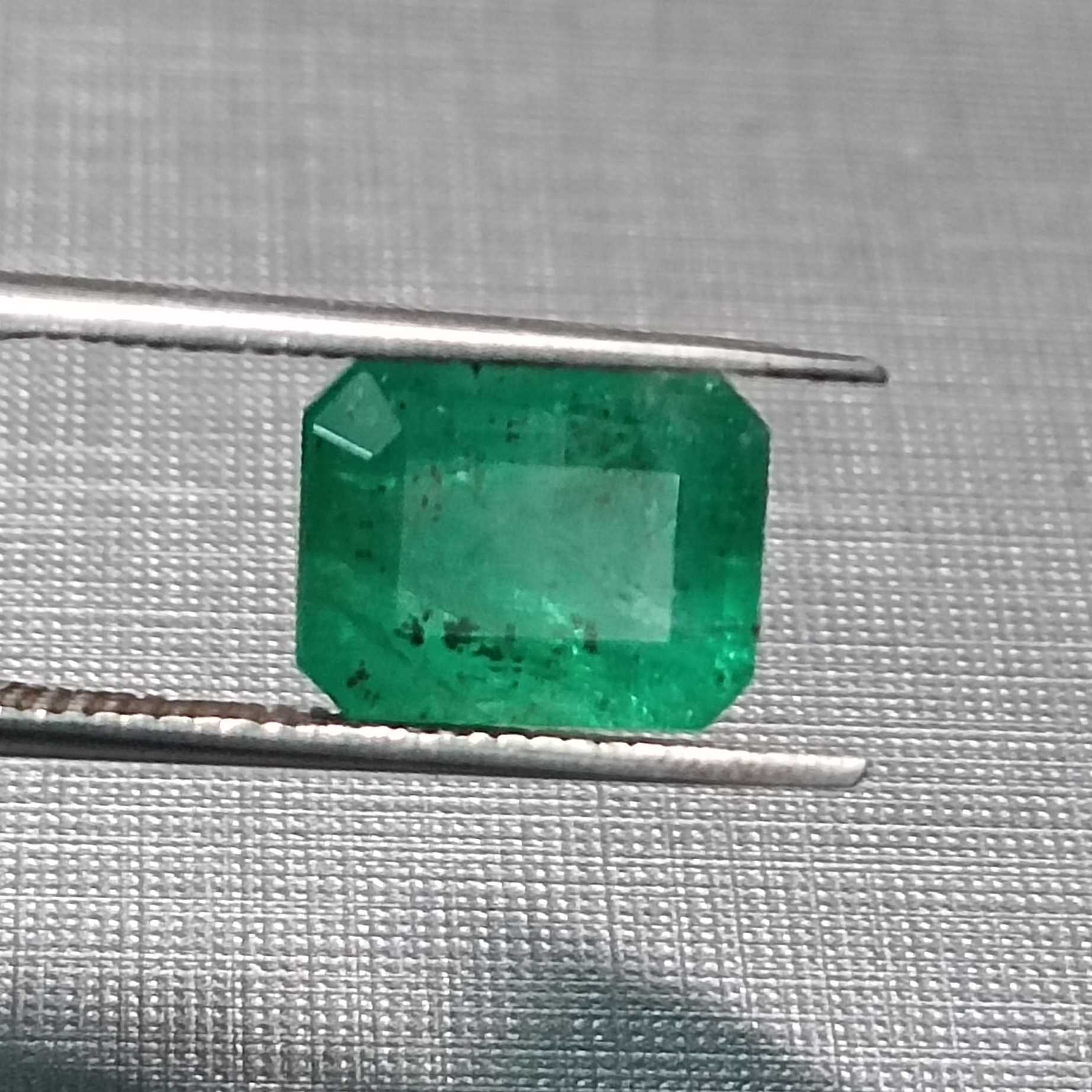 3.06ct GSI certified medium green emerald cut emerald stone