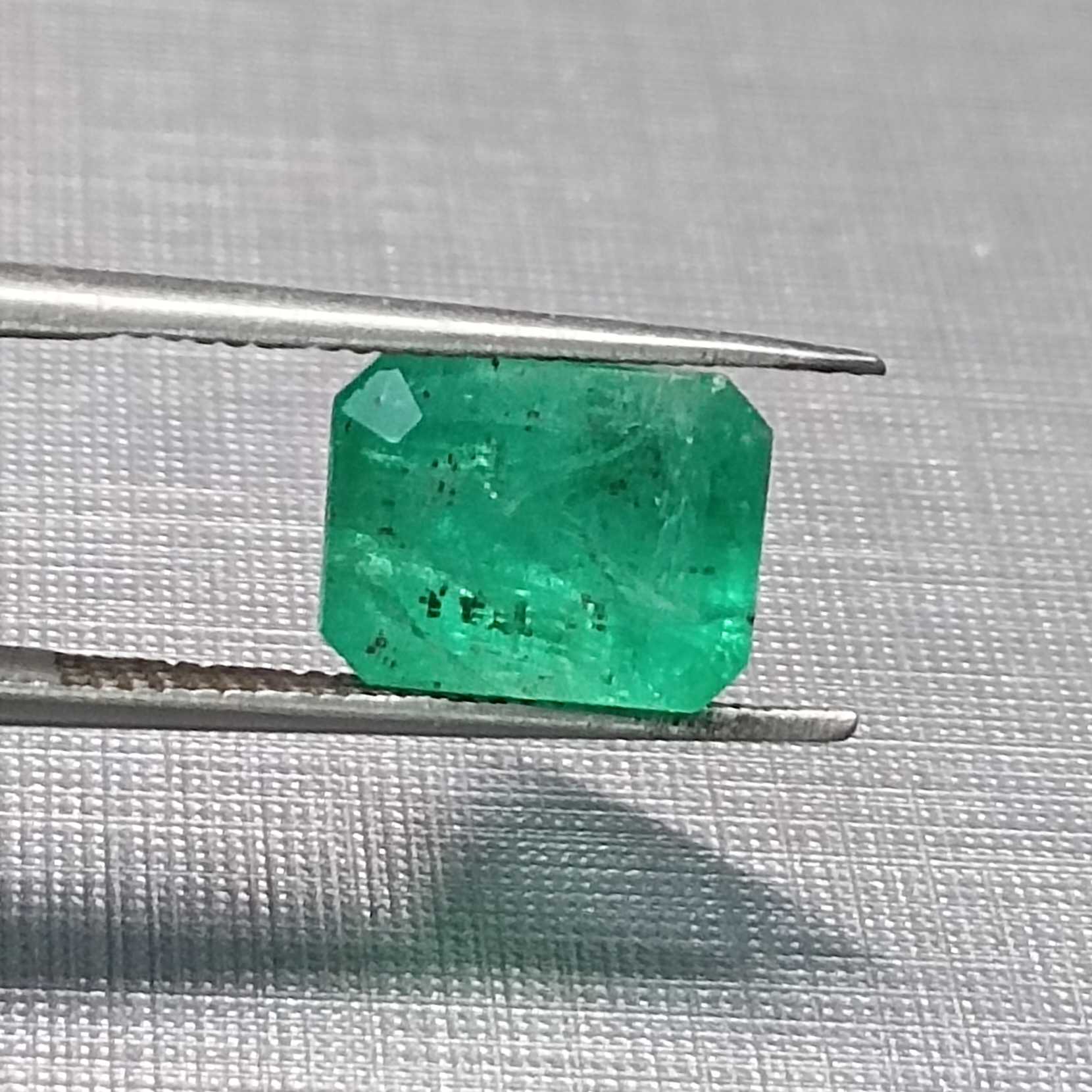 3.06ct GSI certified medium green emerald cut emerald stone