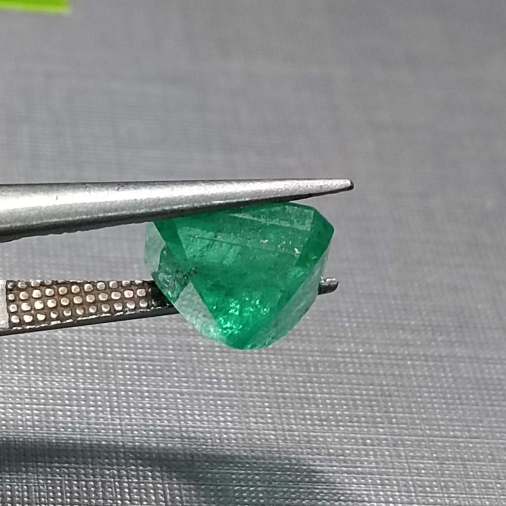 3.06ct GSI certified medium green emerald cut emerald stone