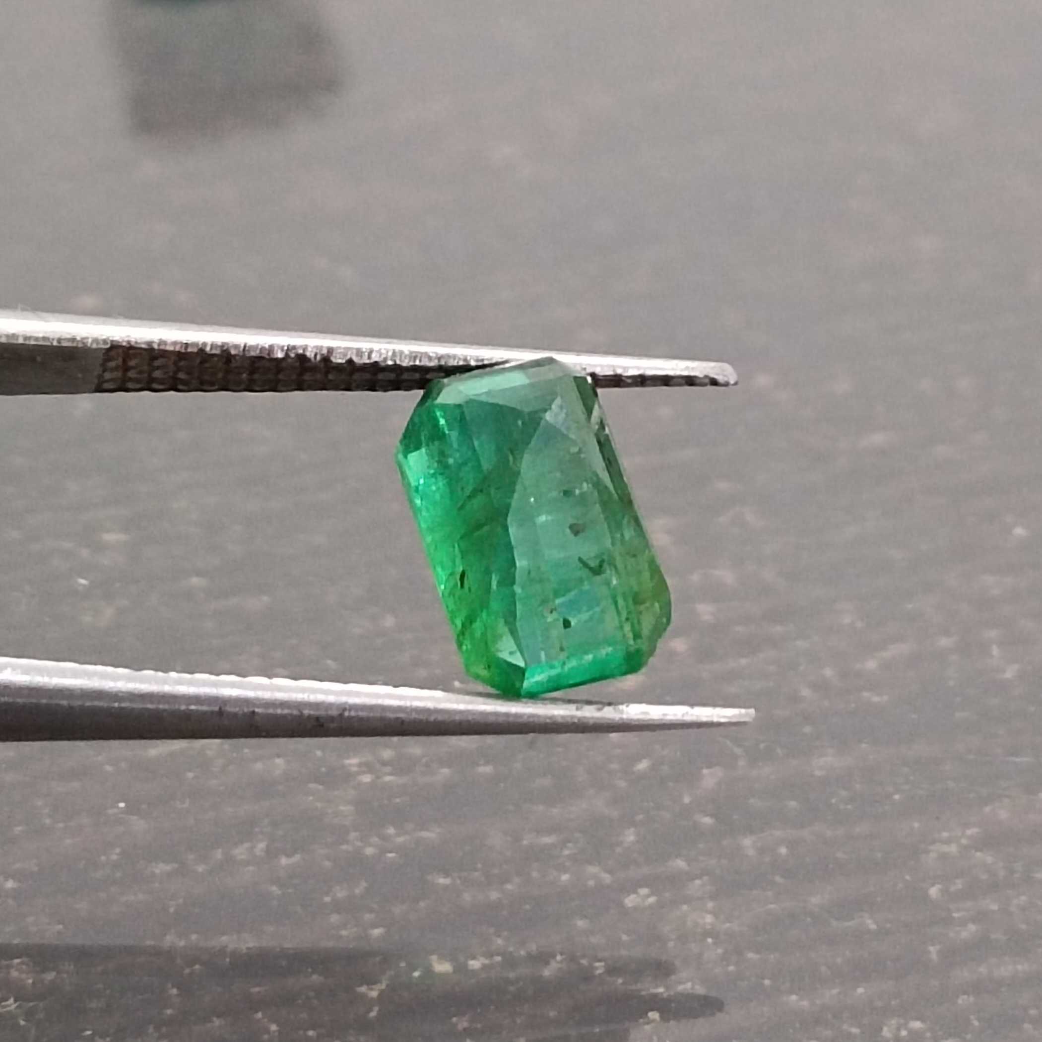 2.06ct certified vivid green octagon cut emerald gemstone