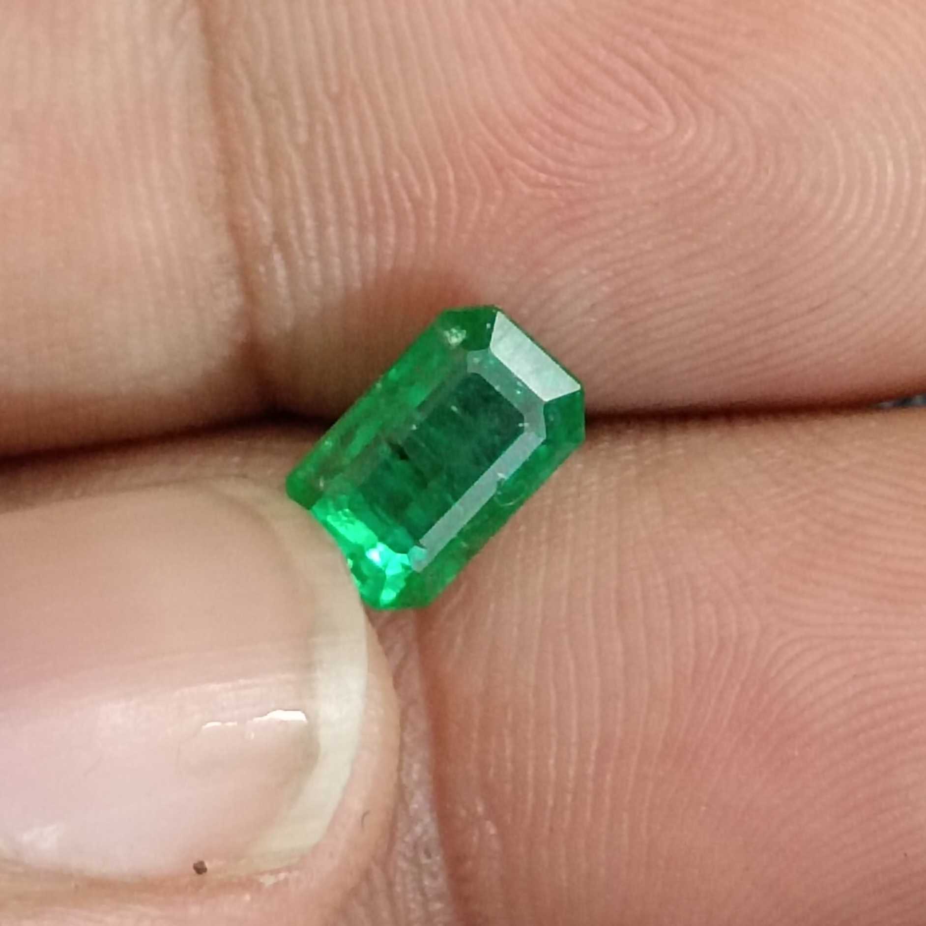 2.06ct certified vivid green octagon cut emerald gemstone