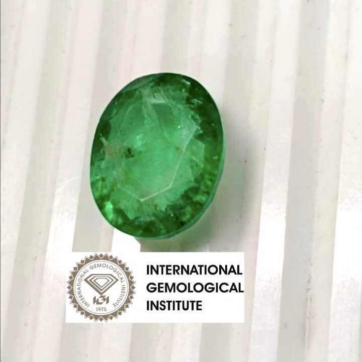 13.36ct IGI certified natural neon green oval shape Swat emerald gemstone  