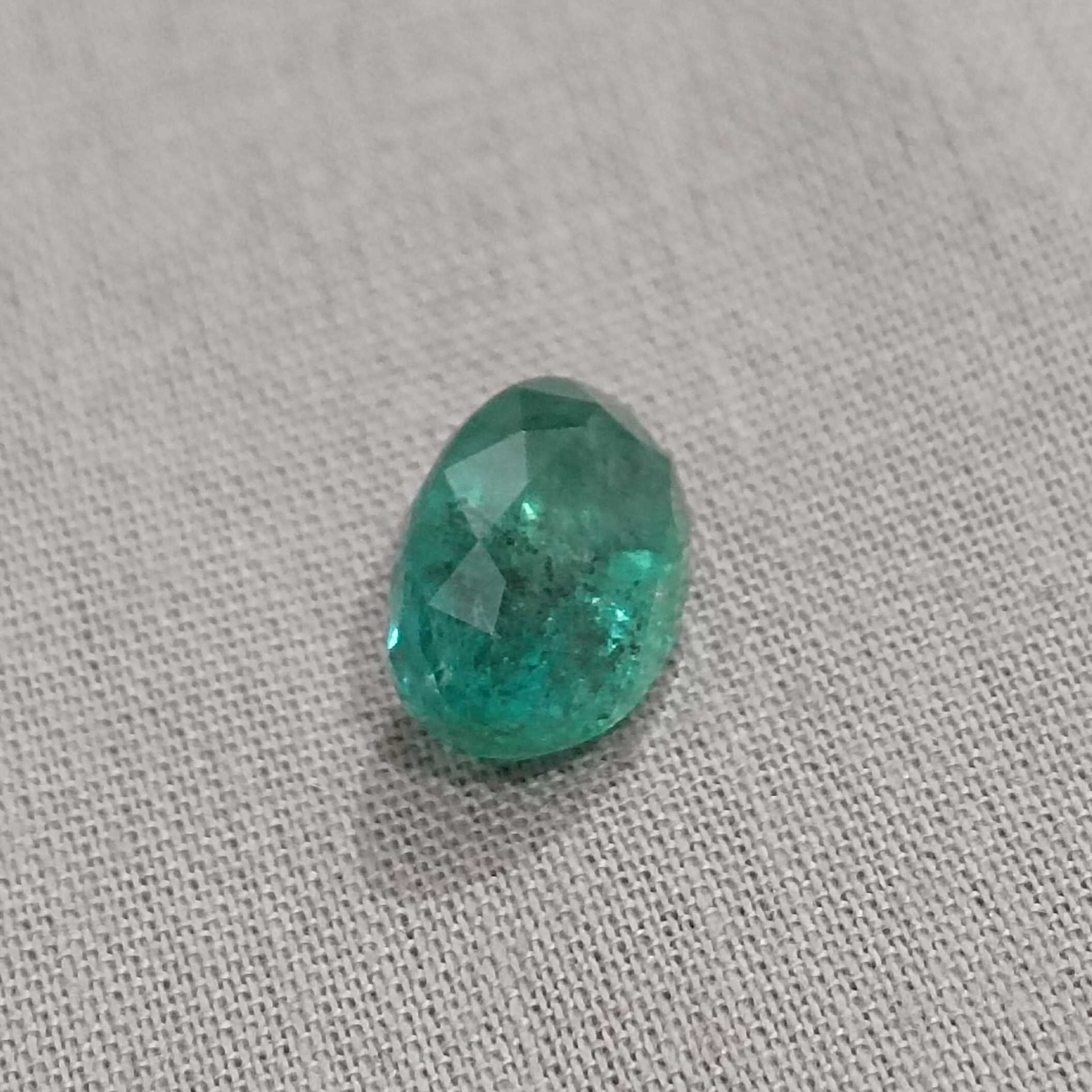 3.68ct medium deep green color oval cut emerald stone