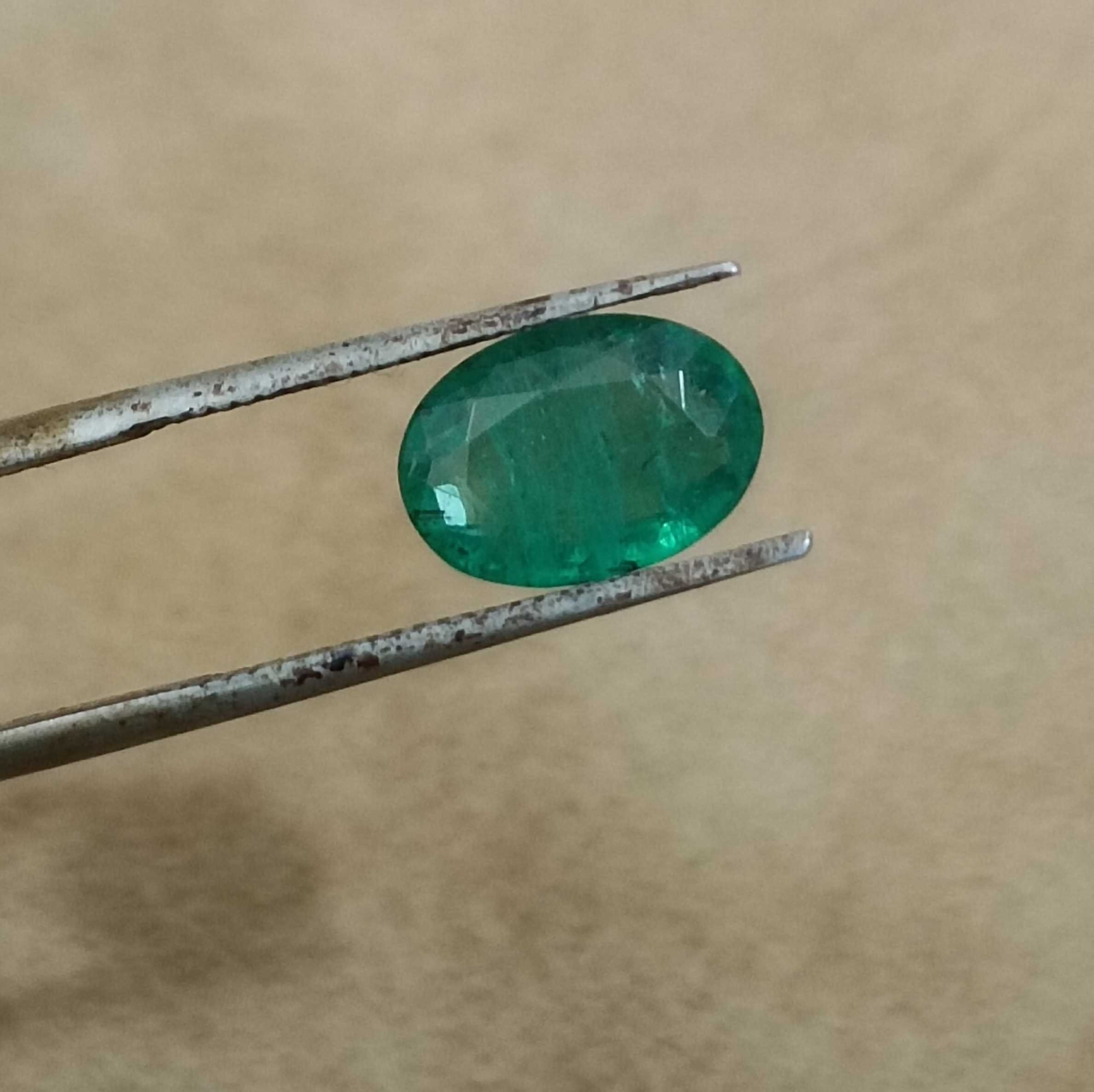 1.67ct (USA) certified deep pure green oval cut emerald gemstone 