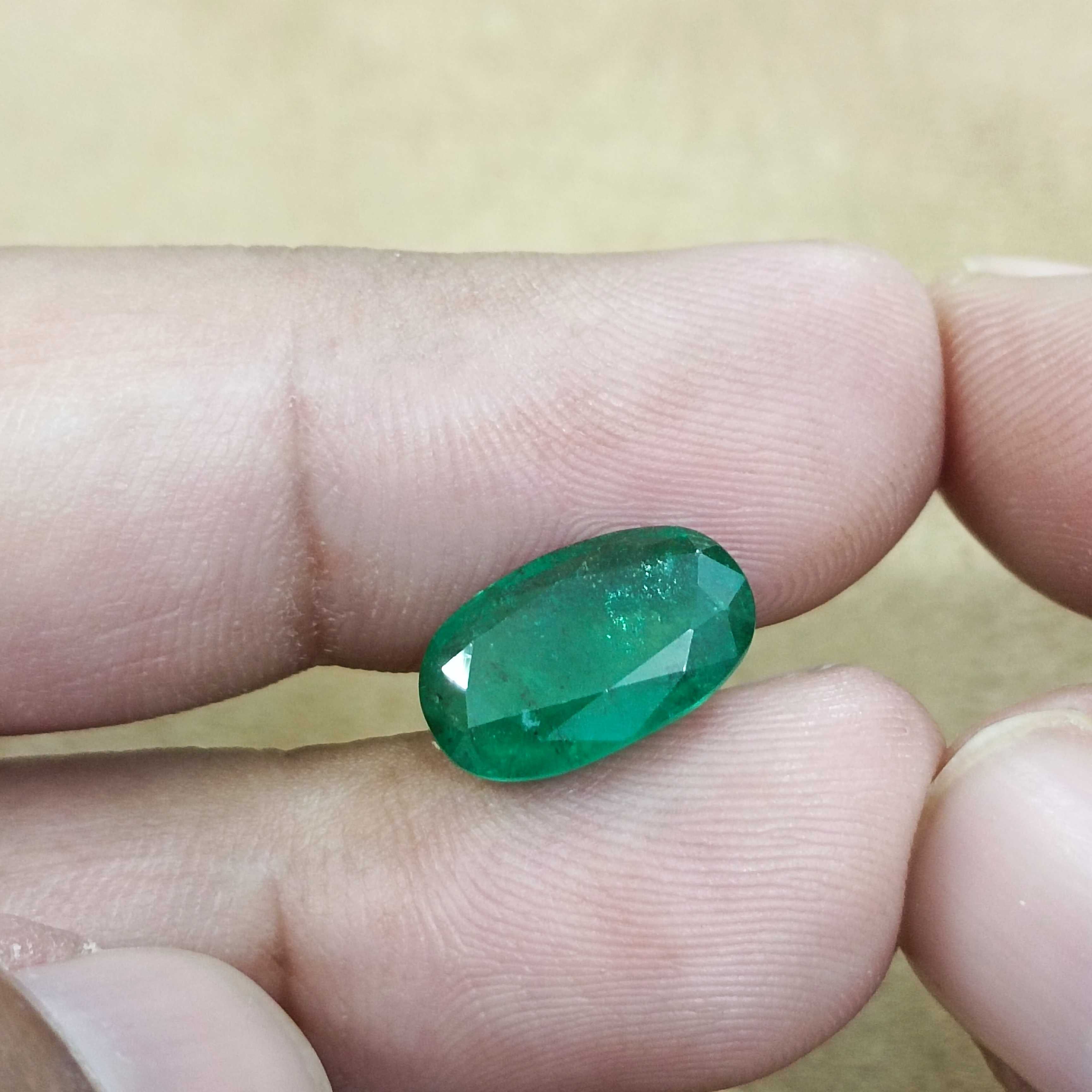 4.36ct GSI certified deep vivid green elongated oval cut Zambian emerald gem 