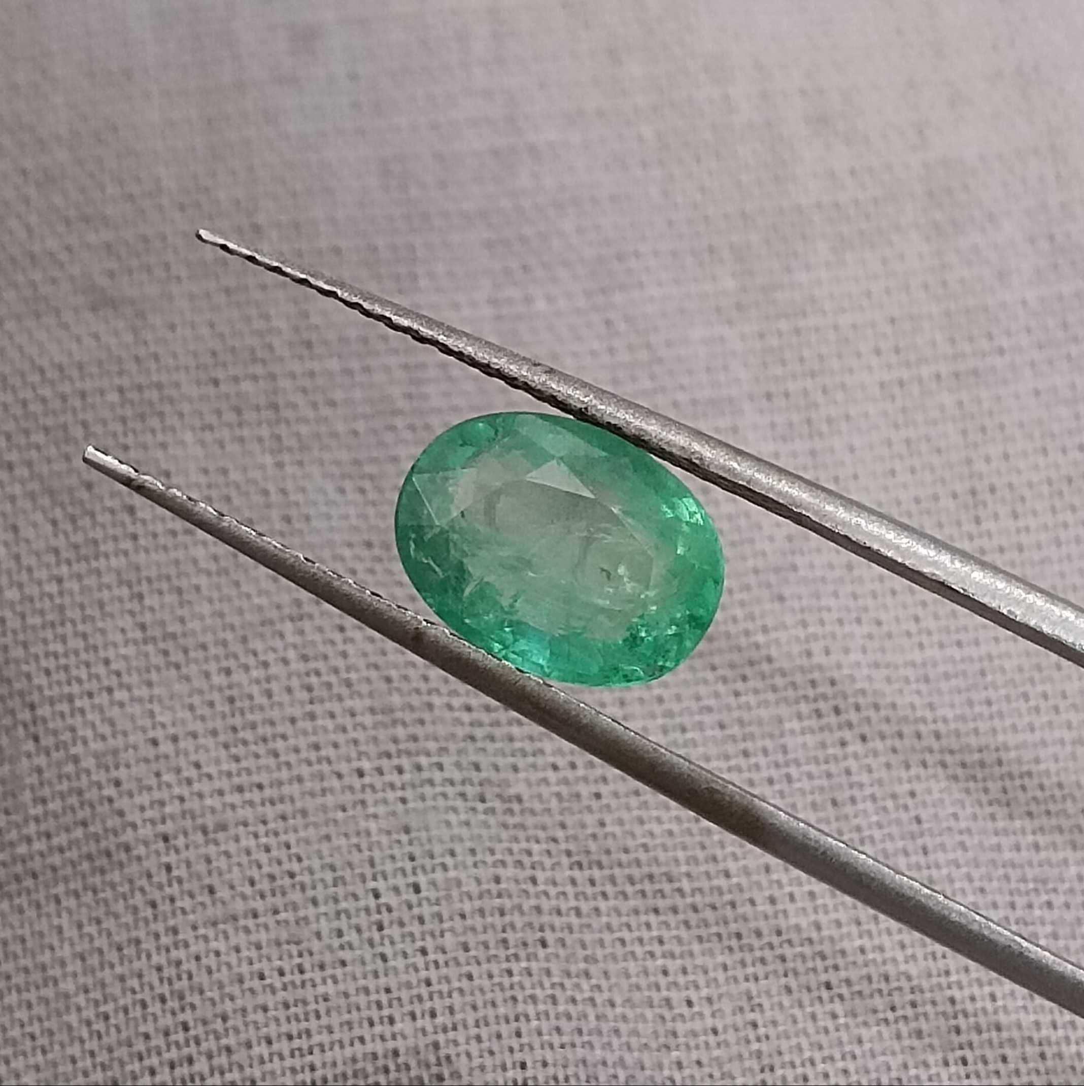 1.97ct medium light green oval shape emerald stone