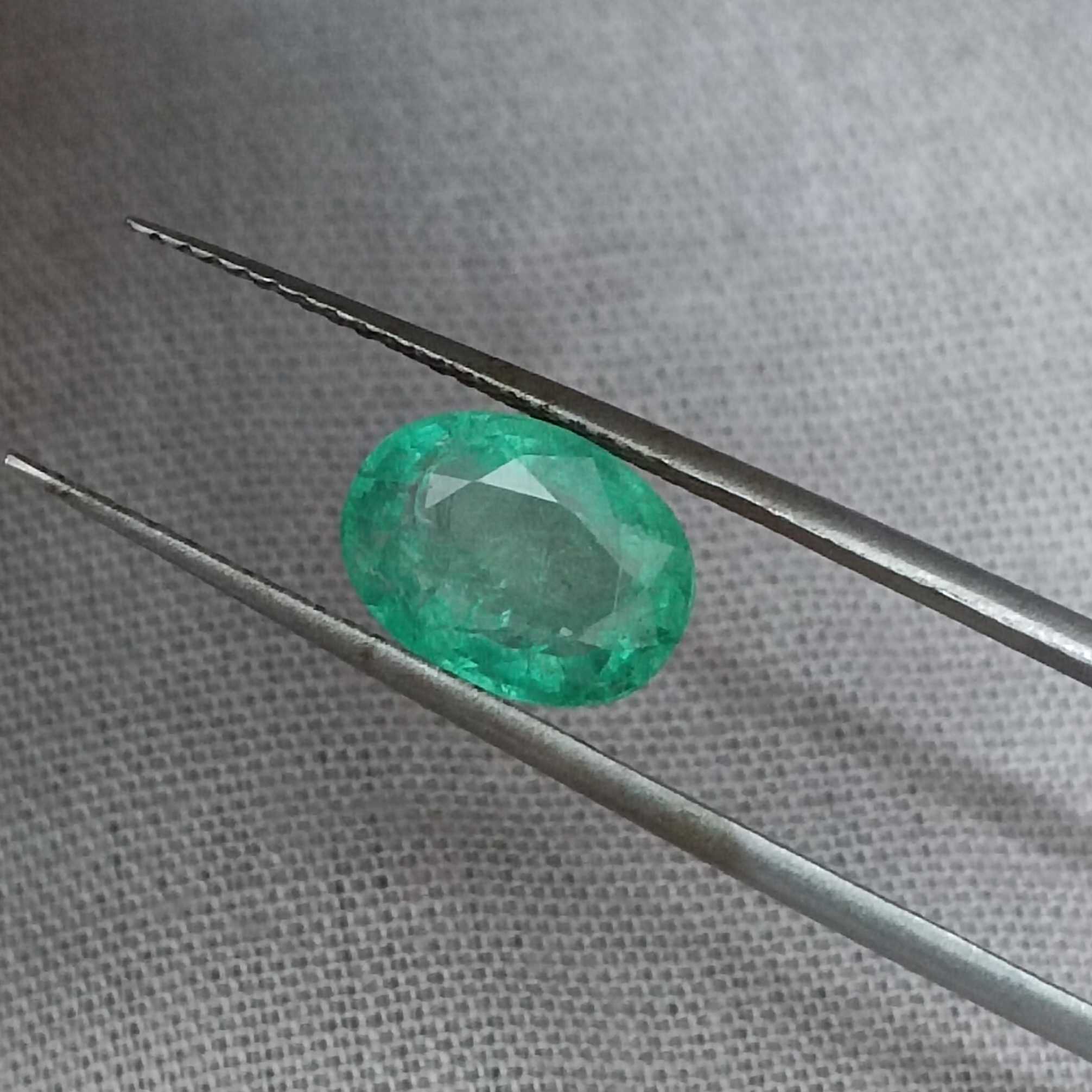 1.97ct medium light green oval shape emerald stone