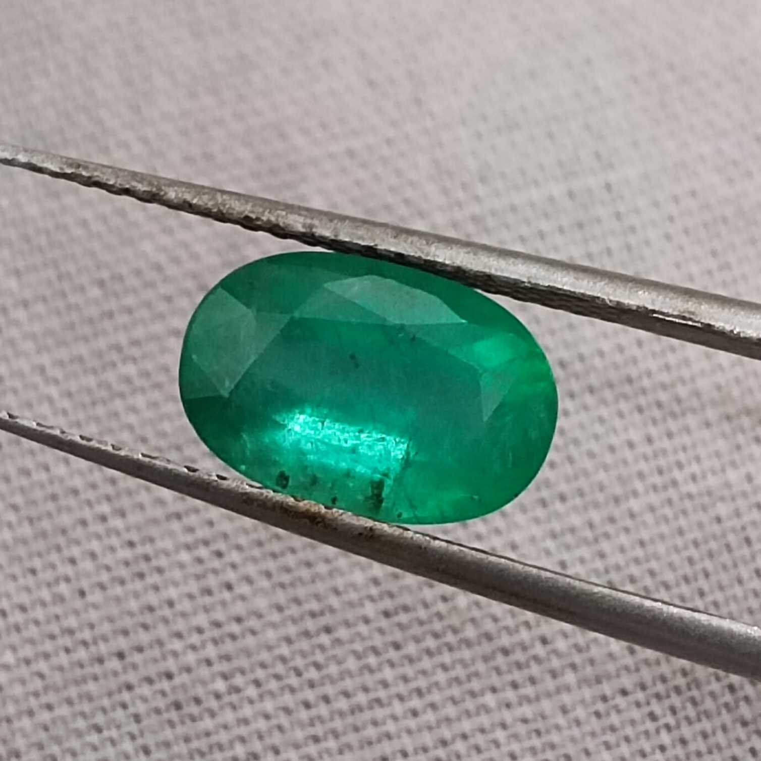 2.16ct GSI certified misty golden green oval cut Colombian emerald gem