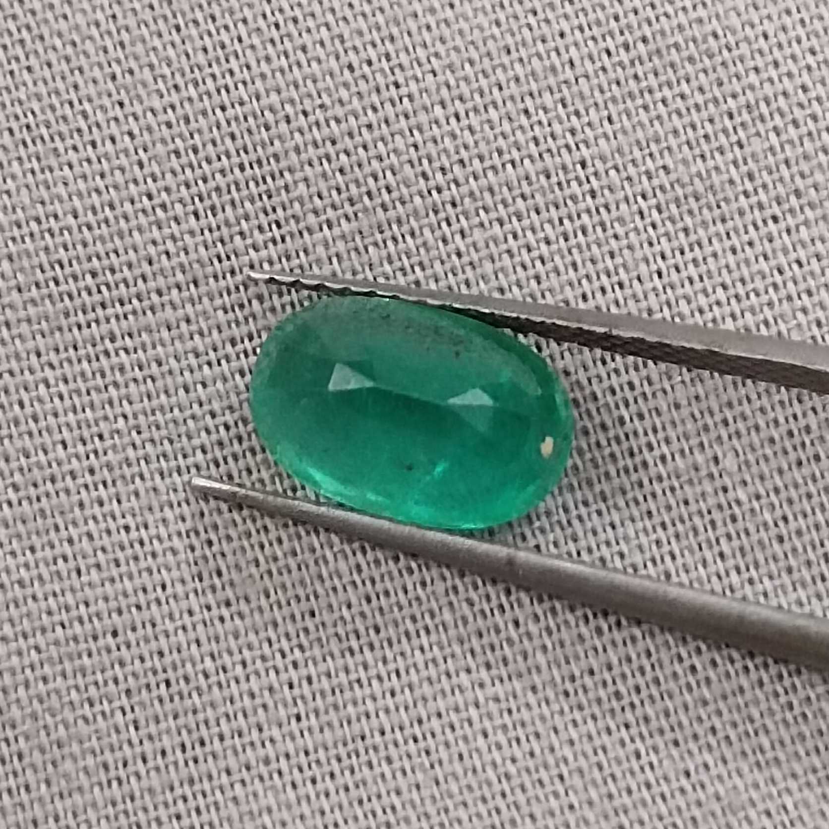 2.16ct GSI certified misty golden green oval cut Colombian emerald gem