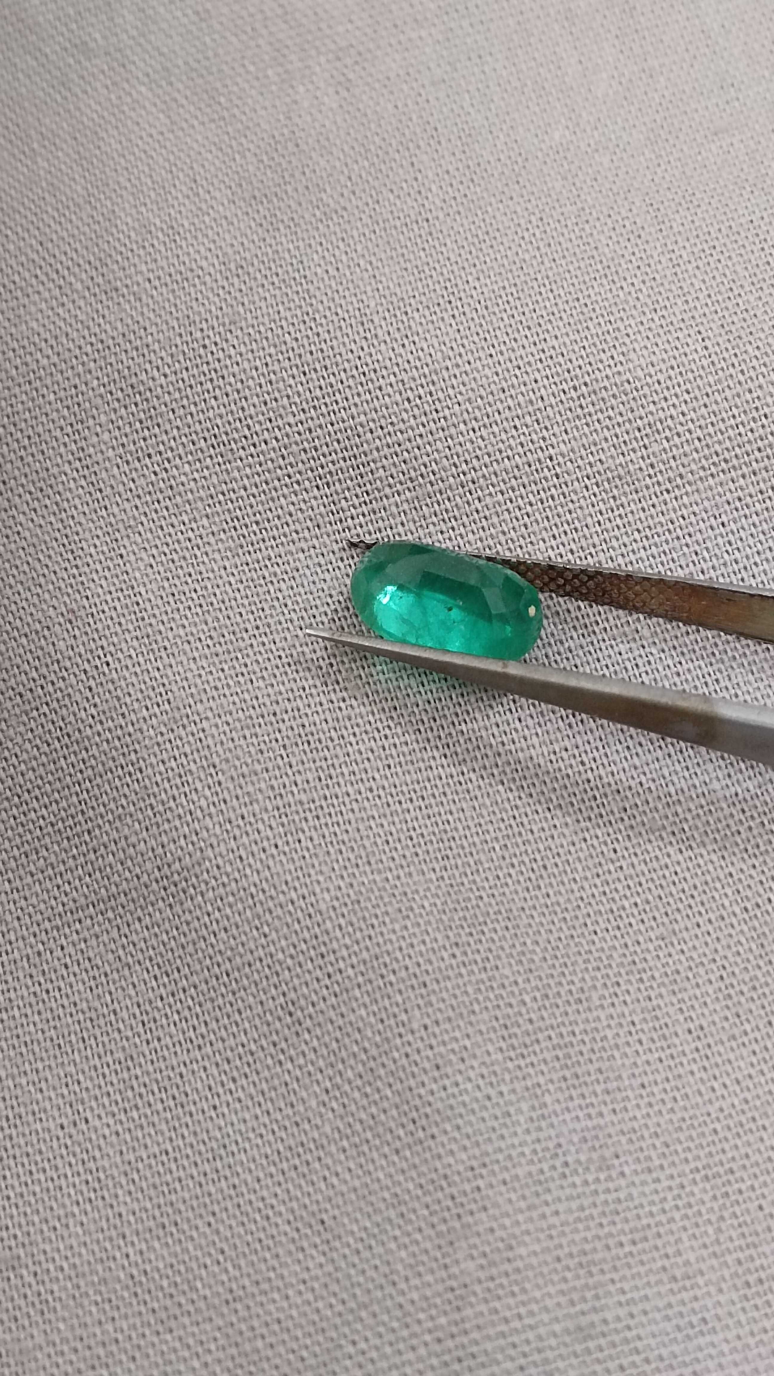 2.16ct GSI certified misty golden green oval cut Colombian emerald gem