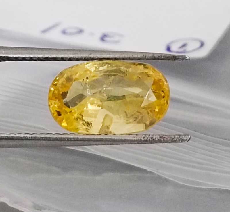3.01ct certified vivid golden yellow unheated oval cut yellow sapphire 