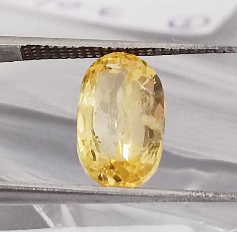 3.01ct certified vivid golden yellow unheated oval cut yellow sapphire /