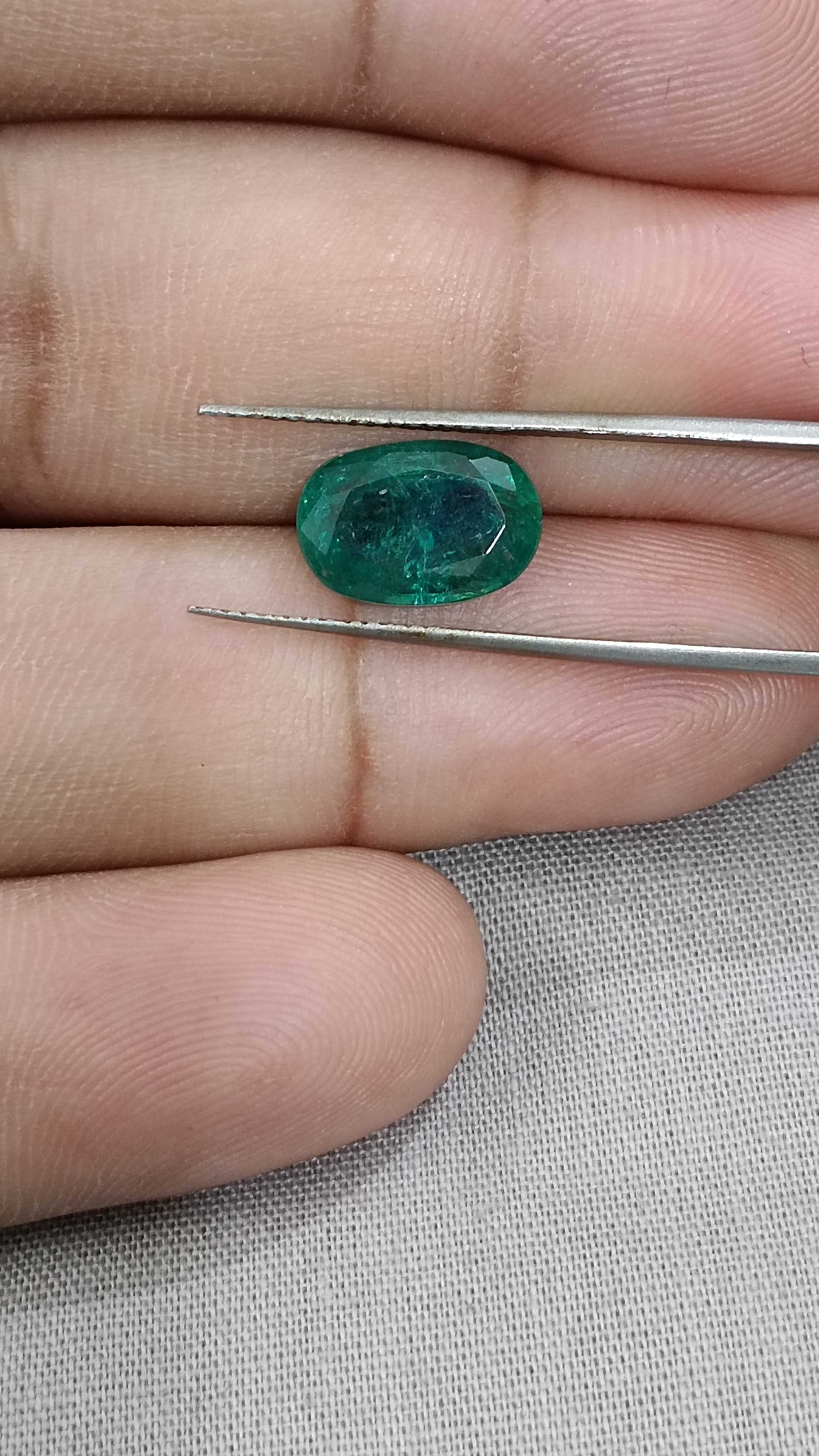 2.93ct oval deep bluish green emerald 