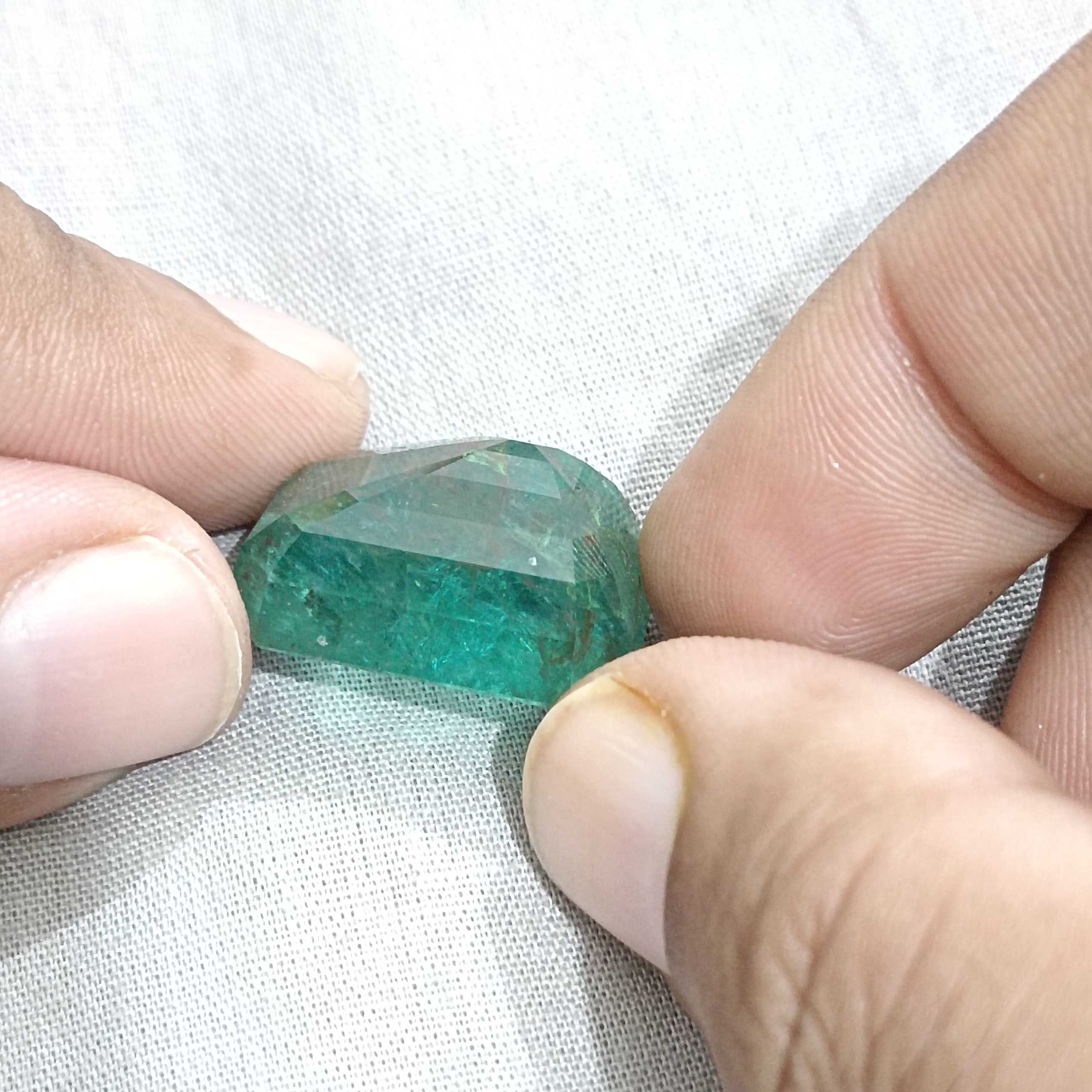 36.95ct GSI certified deep jungle green octagon cut emerald gemstone
