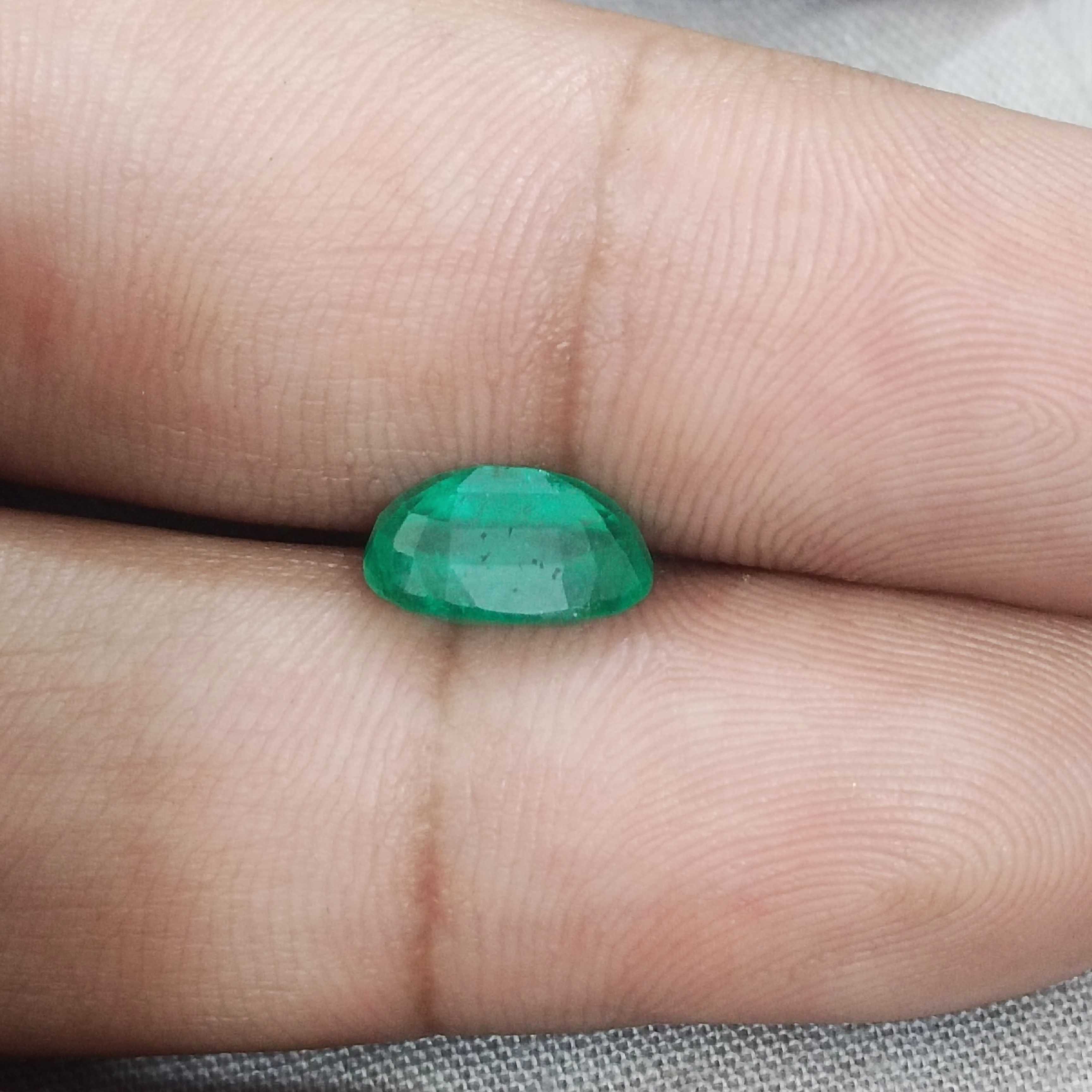 2.16ct GSI certified misty golden green oval cut Colombian emerald gem