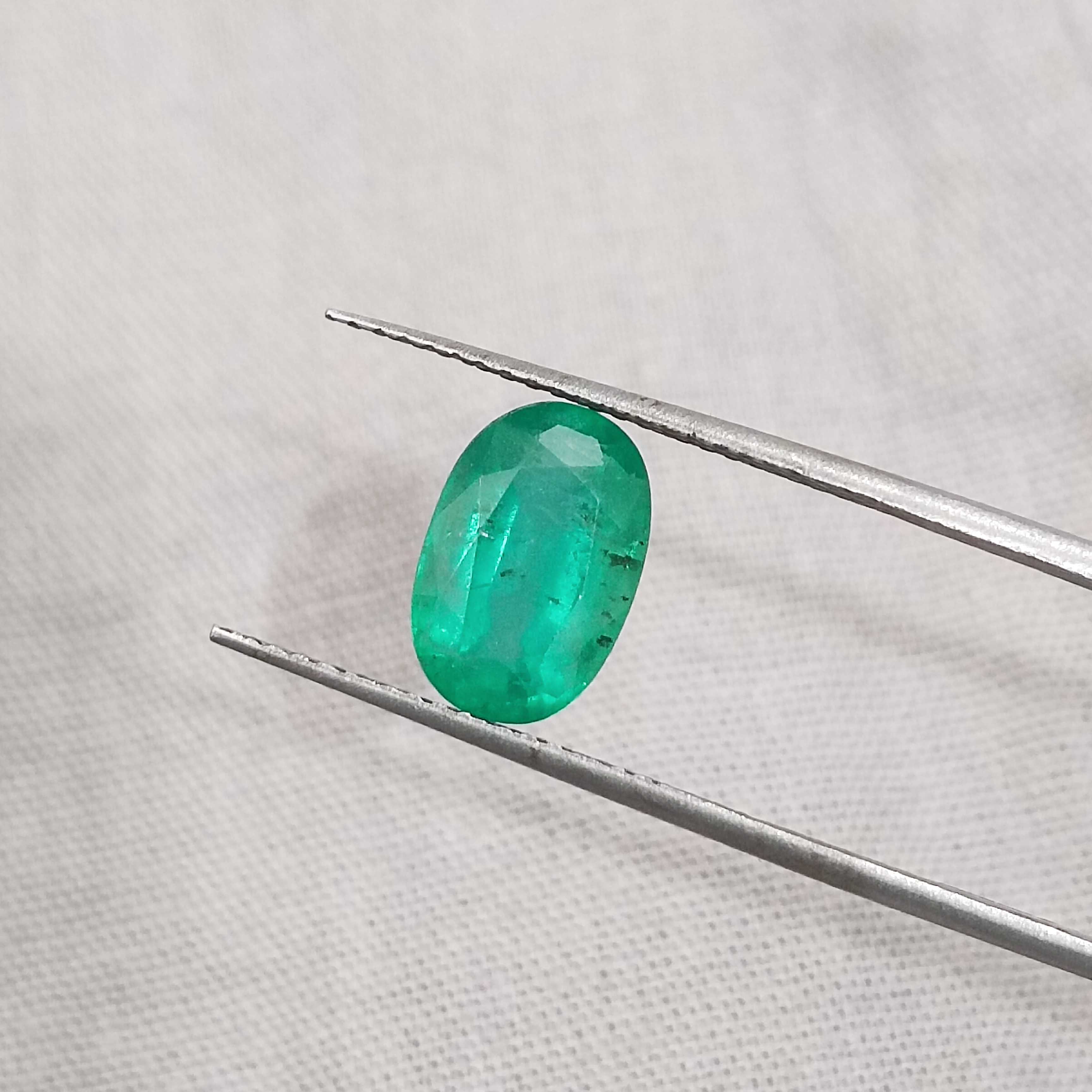 2.16ct GSI certified misty golden green oval cut Colombian emerald gem