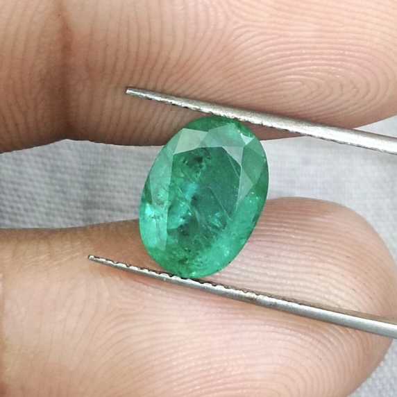 2.43ct GSI certified medium green oval cut Swat emerald gemstone 
