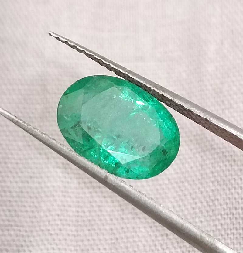 2.43ct GSI certified medium green oval cut Swat emerald gemstone 