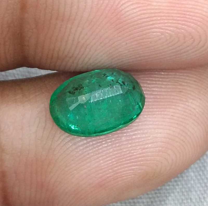 2.43ct GSI certified medium green oval cut Swat emerald gemstone 