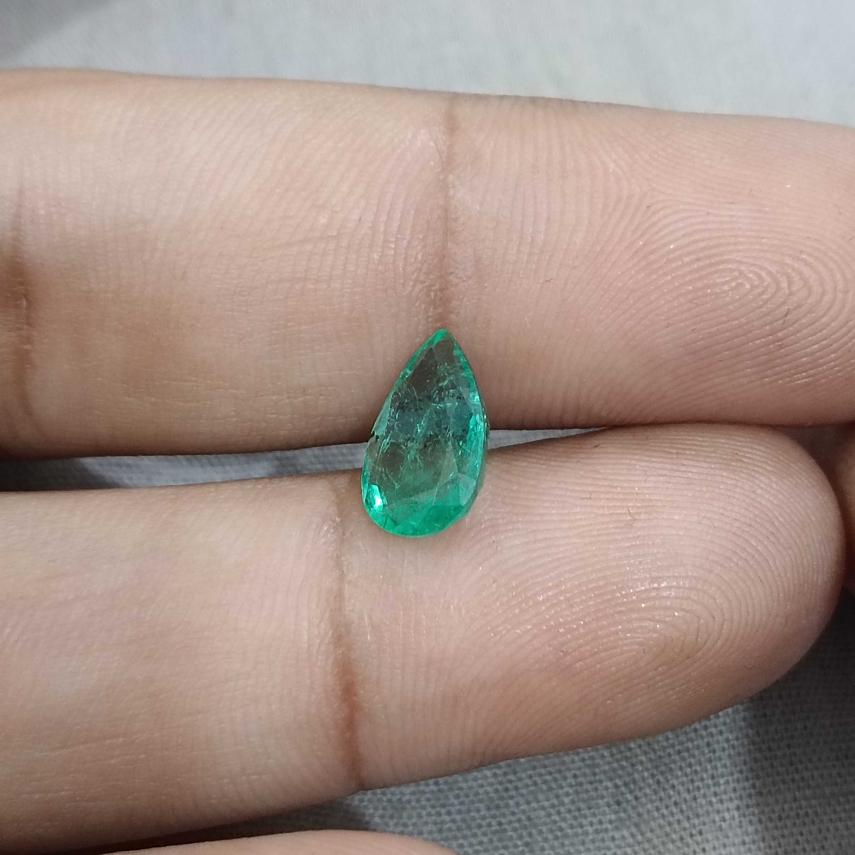 1.81ct medium deep bright golden green pear shape Colombian emerald gemstone 