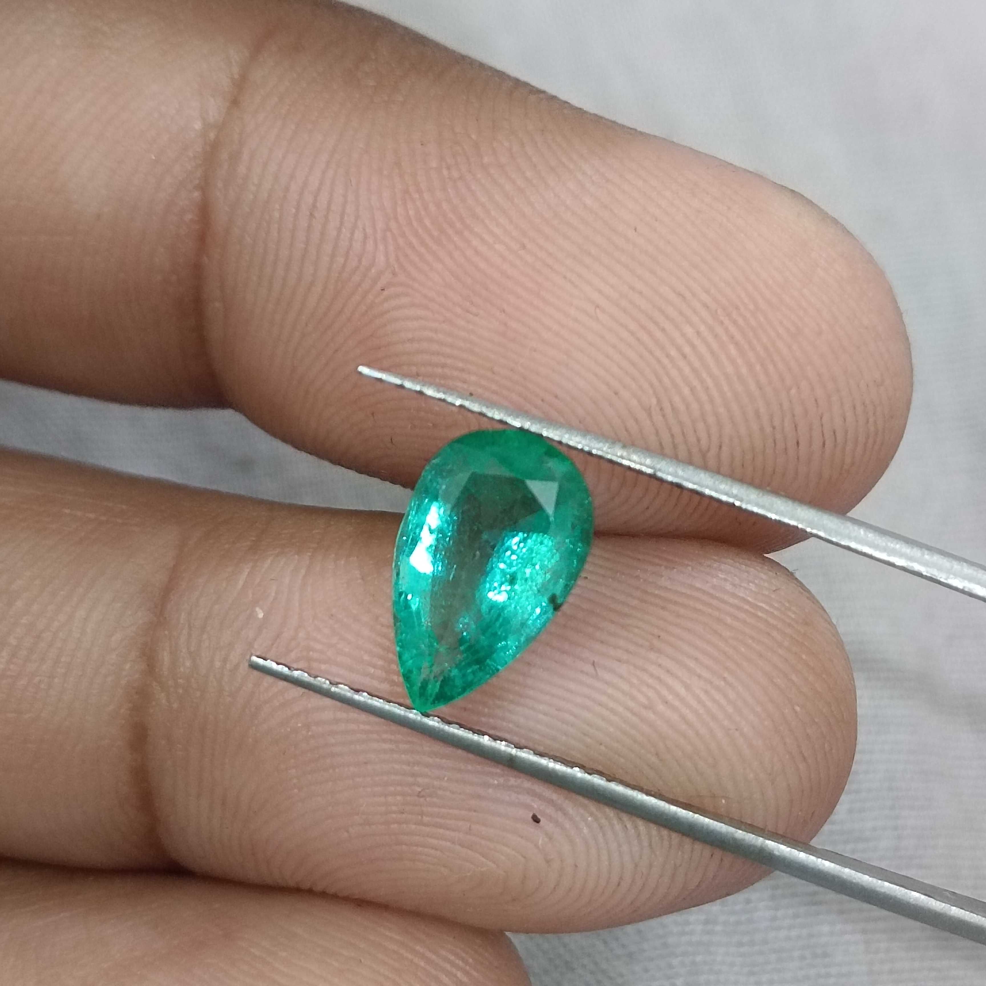 1.81ct medium deep bright golden green pear shape Colombian emerald gemstone 