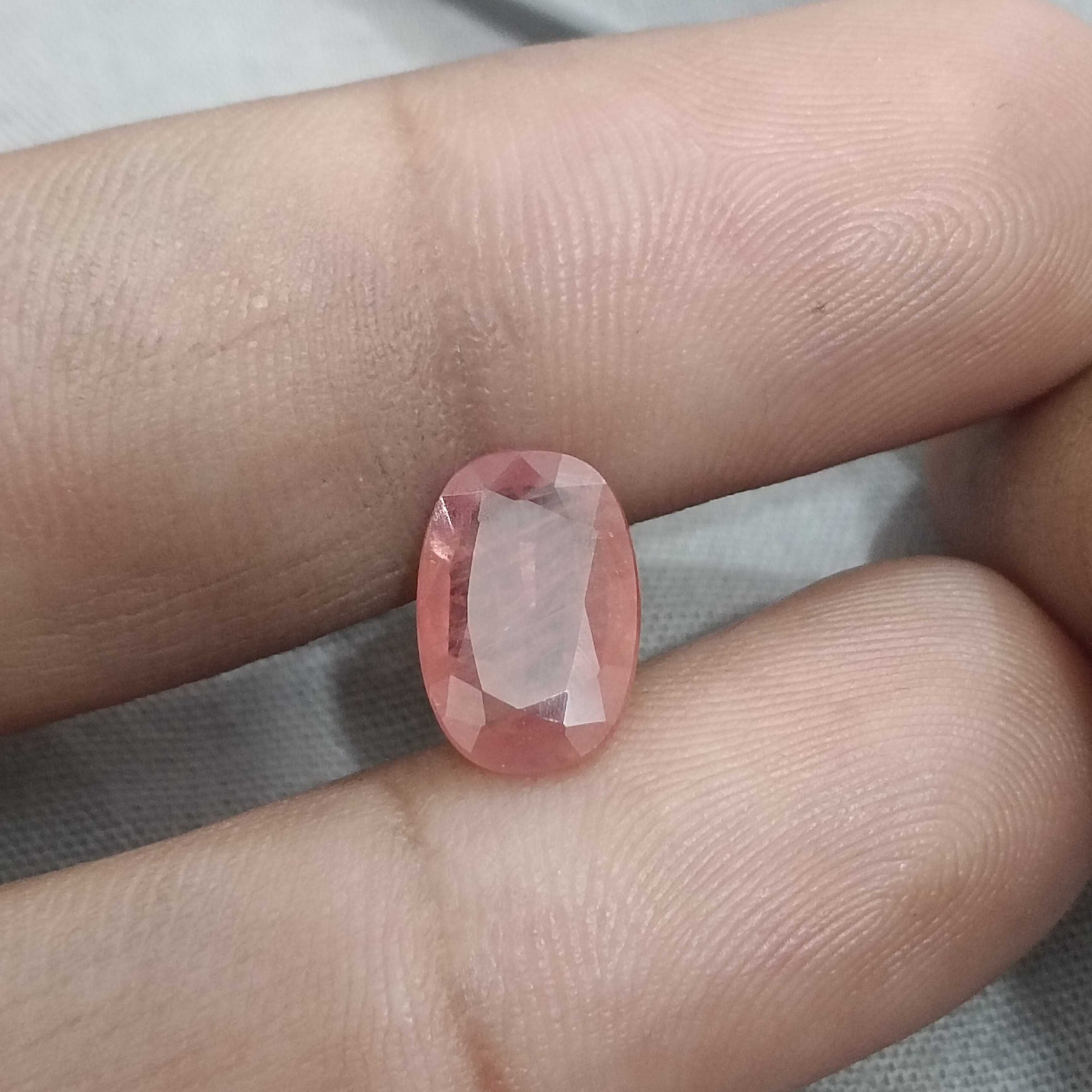 3.29cts IGI certified vivid orangy pink oval cut Ceylon padparadscha sapphire H