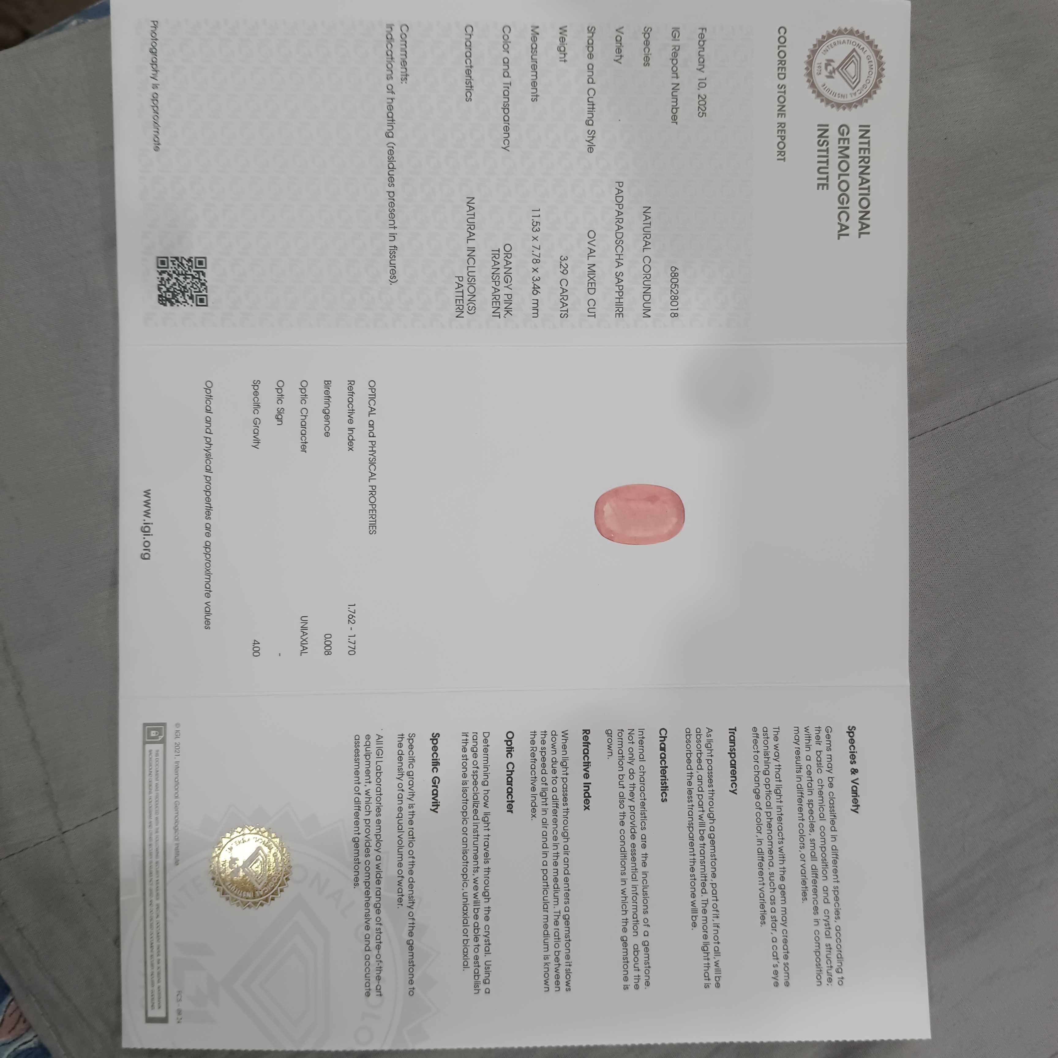 3.29cts IGI certified vivid orangy pink oval cut Ceylon padparadscha sapphire H