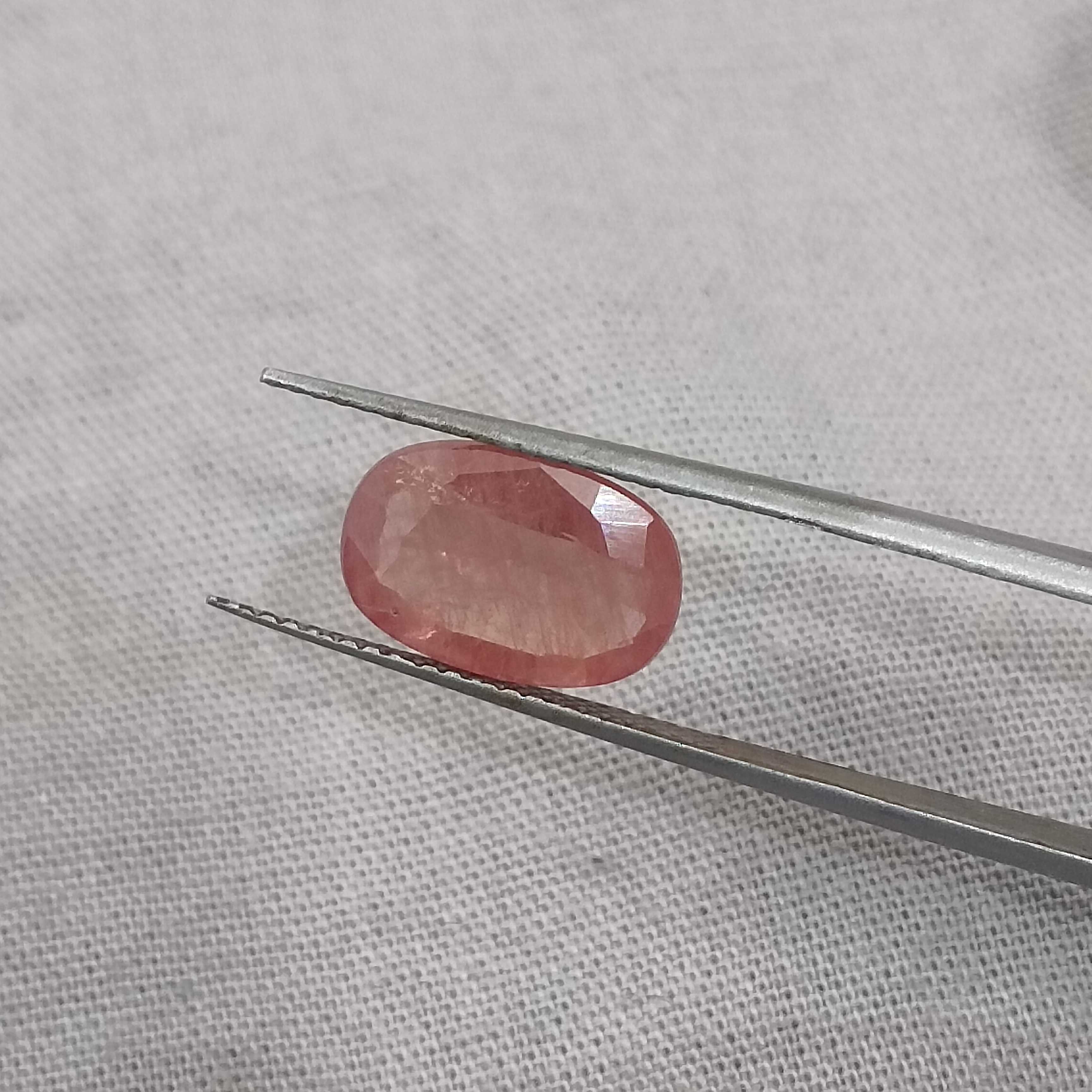3.29cts IGI certified vivid orangy pink oval cut Ceylon padparadscha sapphire H