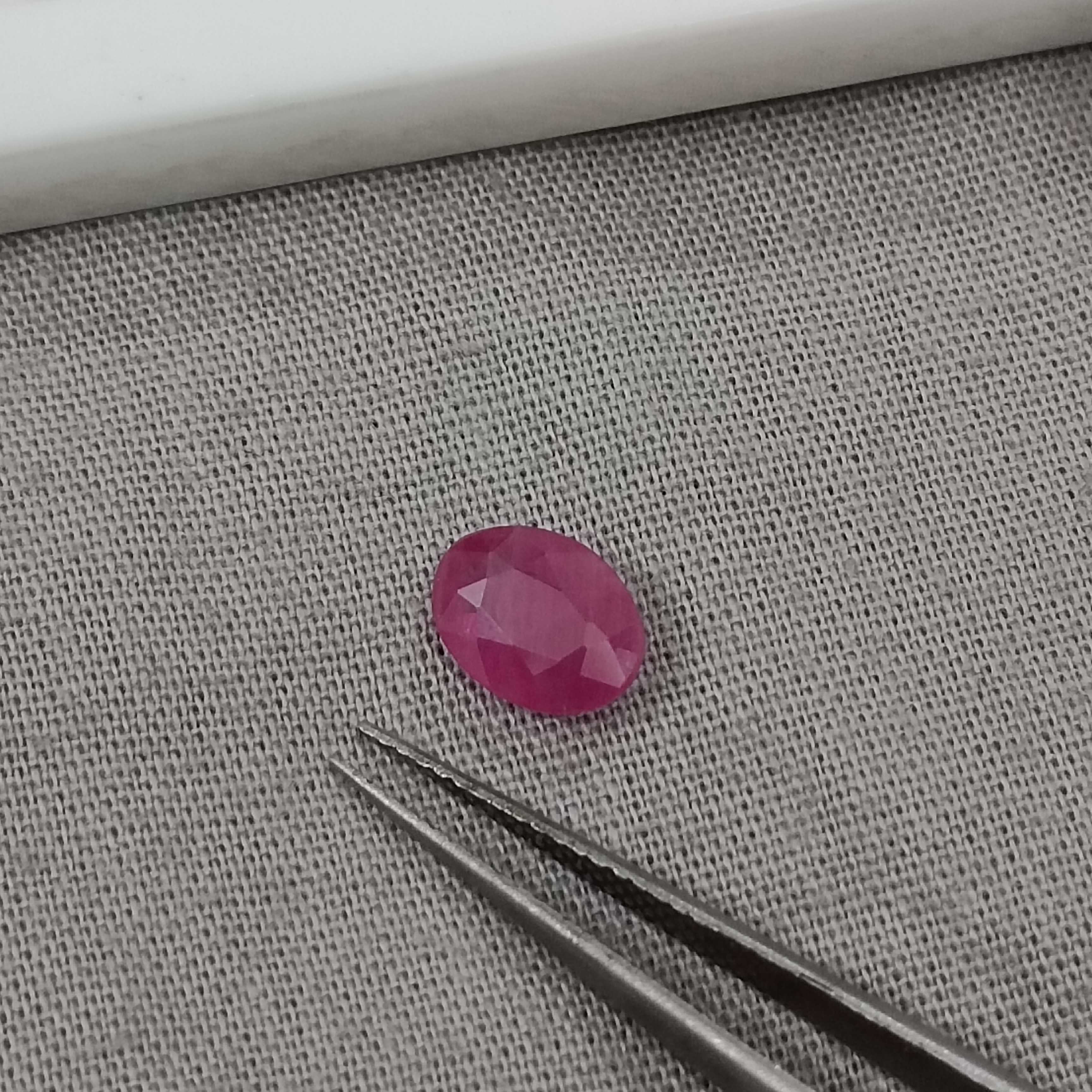 1.22cts certified unheated pinkish red oval shaped African ruby stone