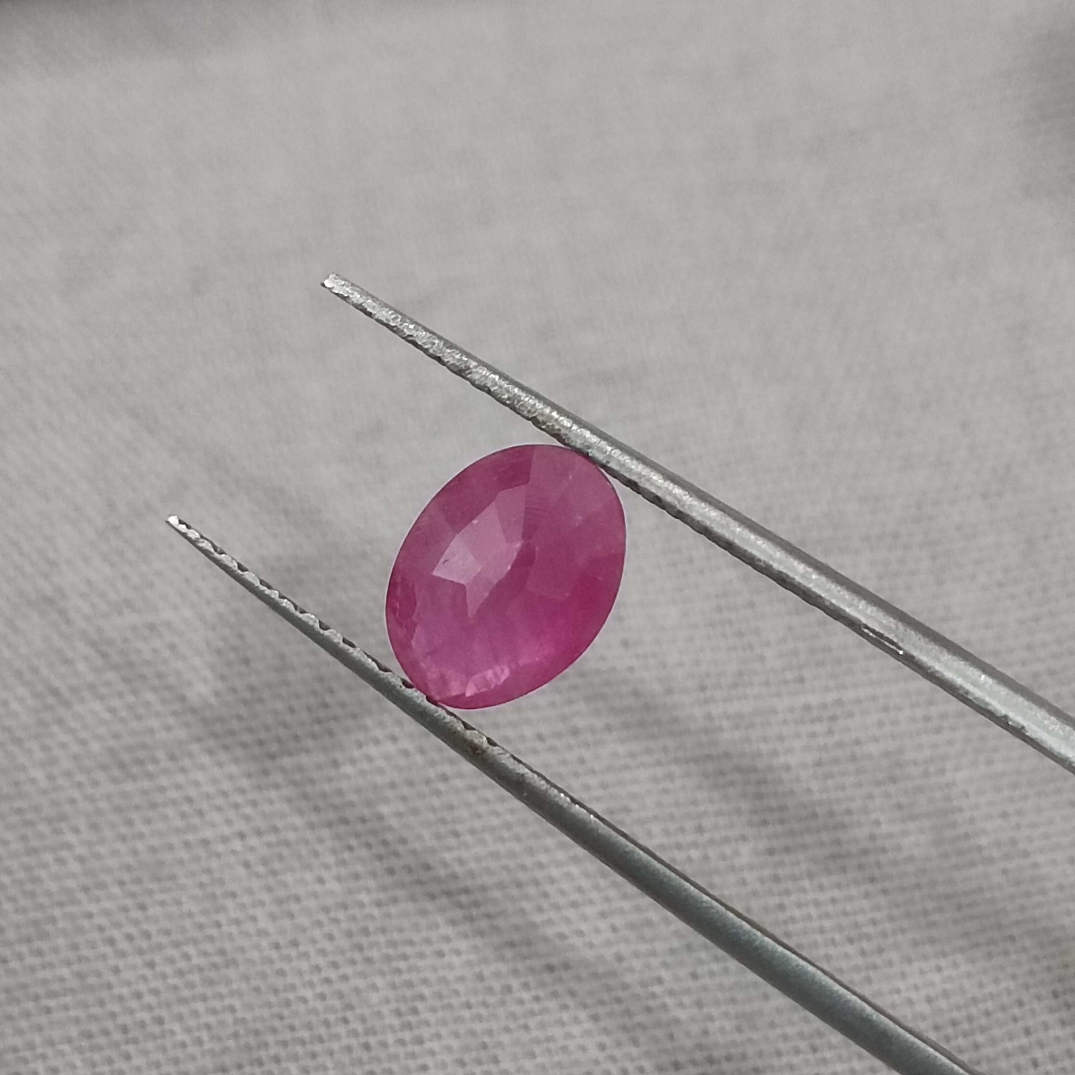 1.22cts certified unheated pinkish red oval shaped African ruby stone