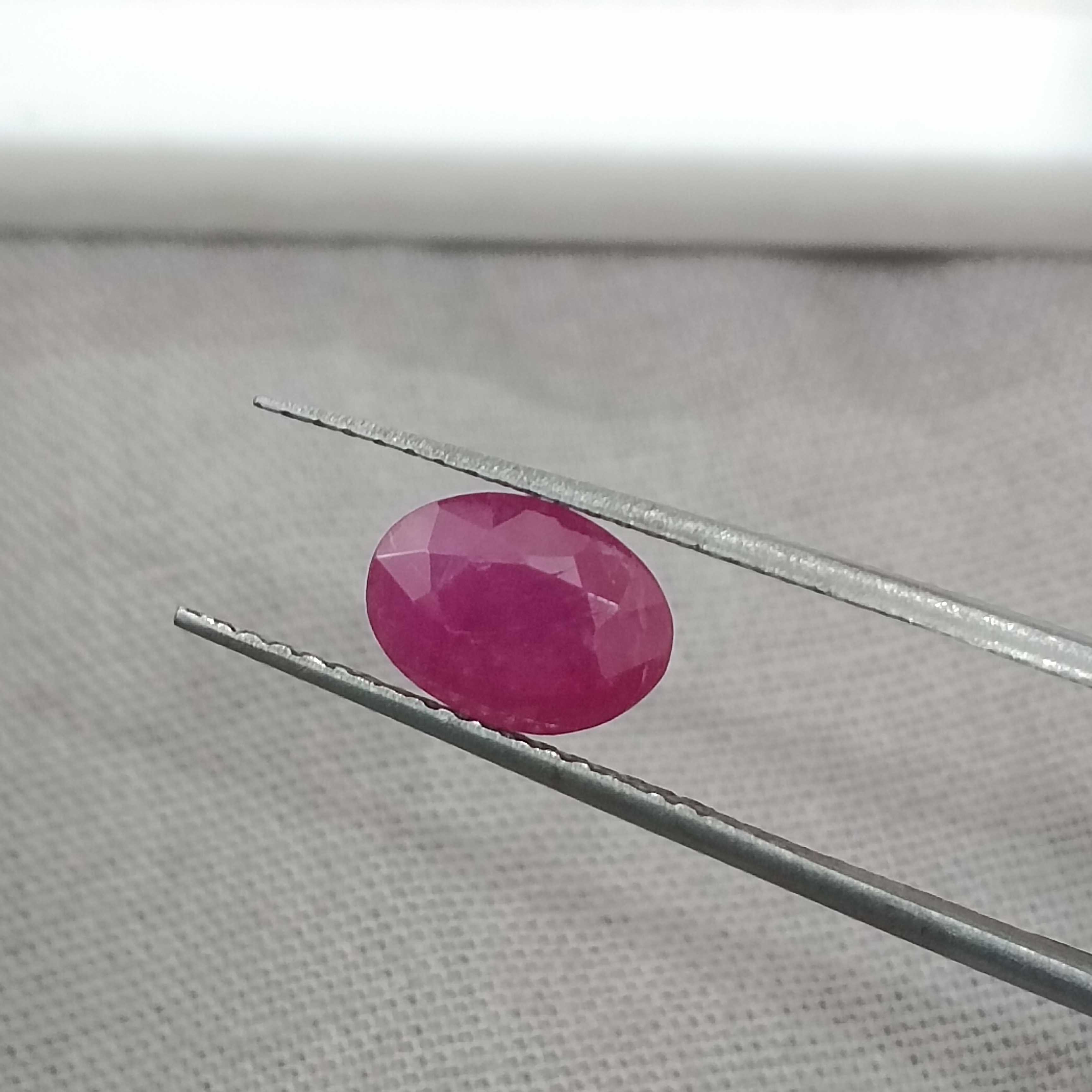 1.34cts certified purplish pinkish red oval cut unheated ruby gem stone