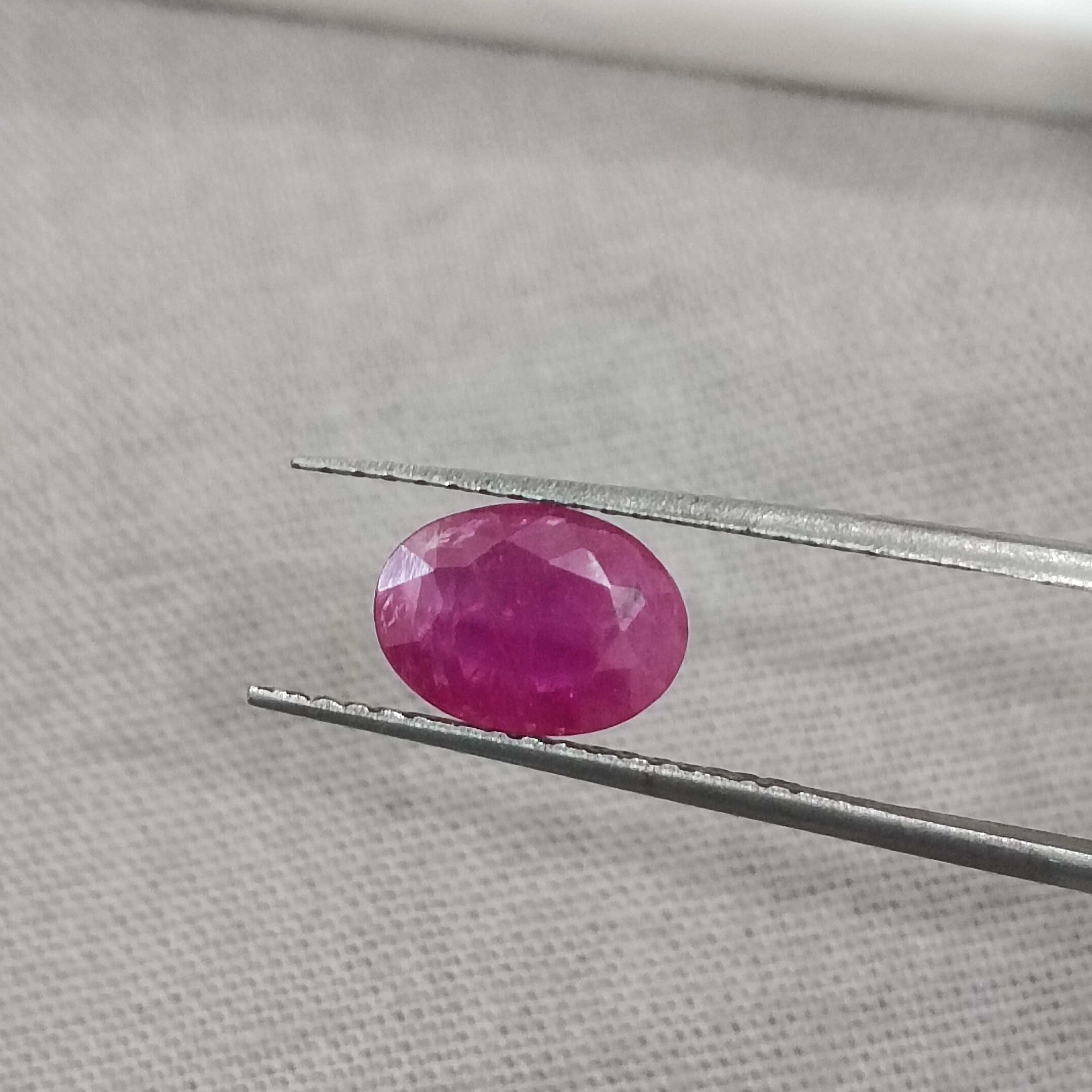1.20cts certified purplish red oval cut unheated African ruby gemstone 