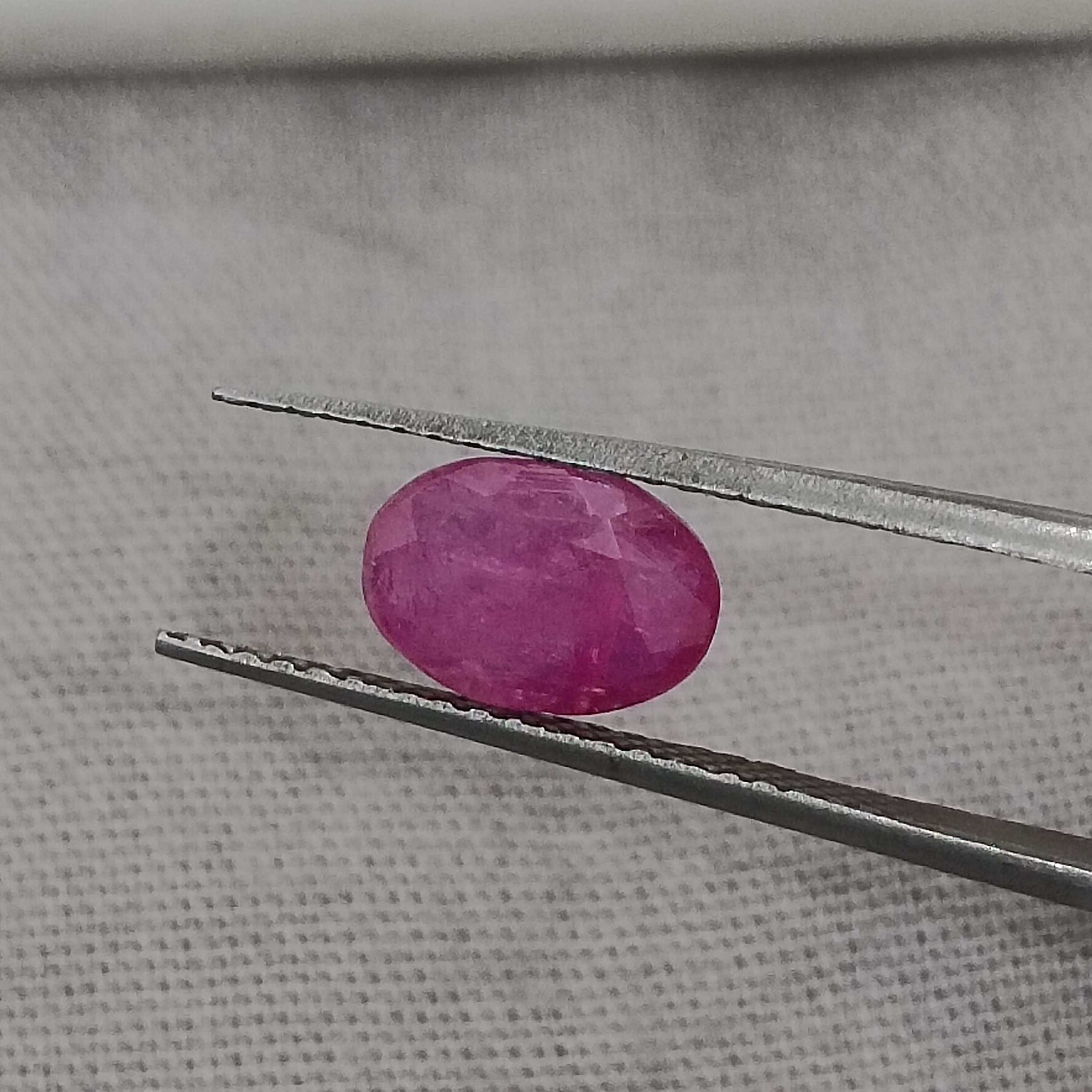 1.26cts GSI certified pinkish red oval cut unheated ruby 
