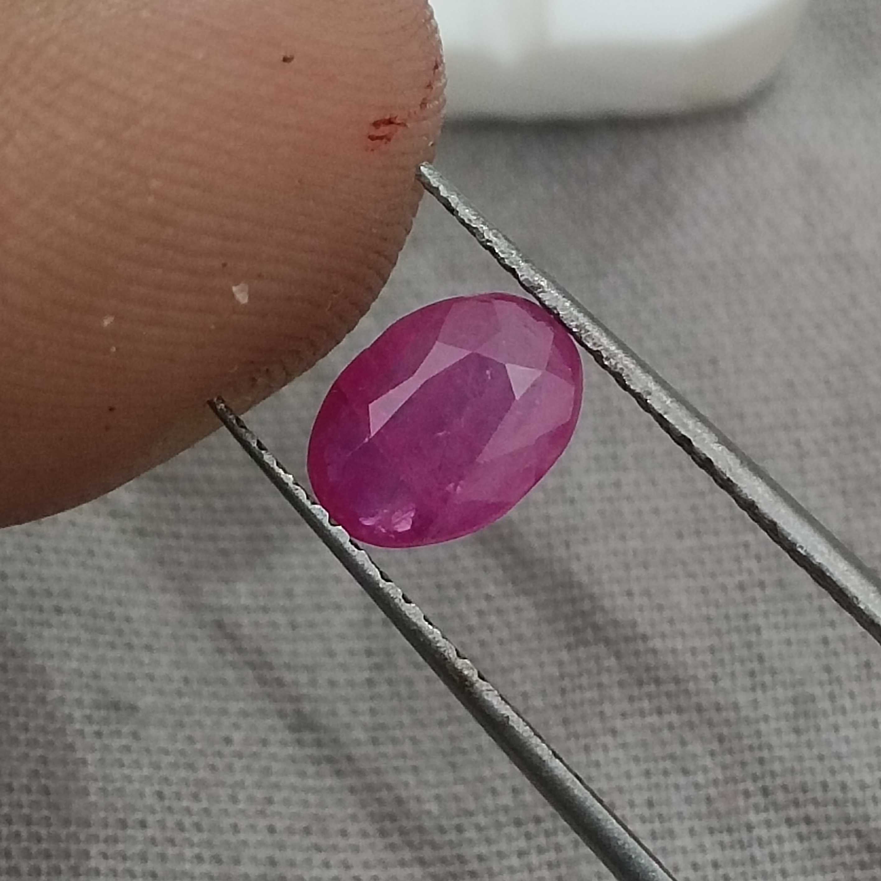 1.26cts GSI certified pinkish red oval cut unheated ruby 