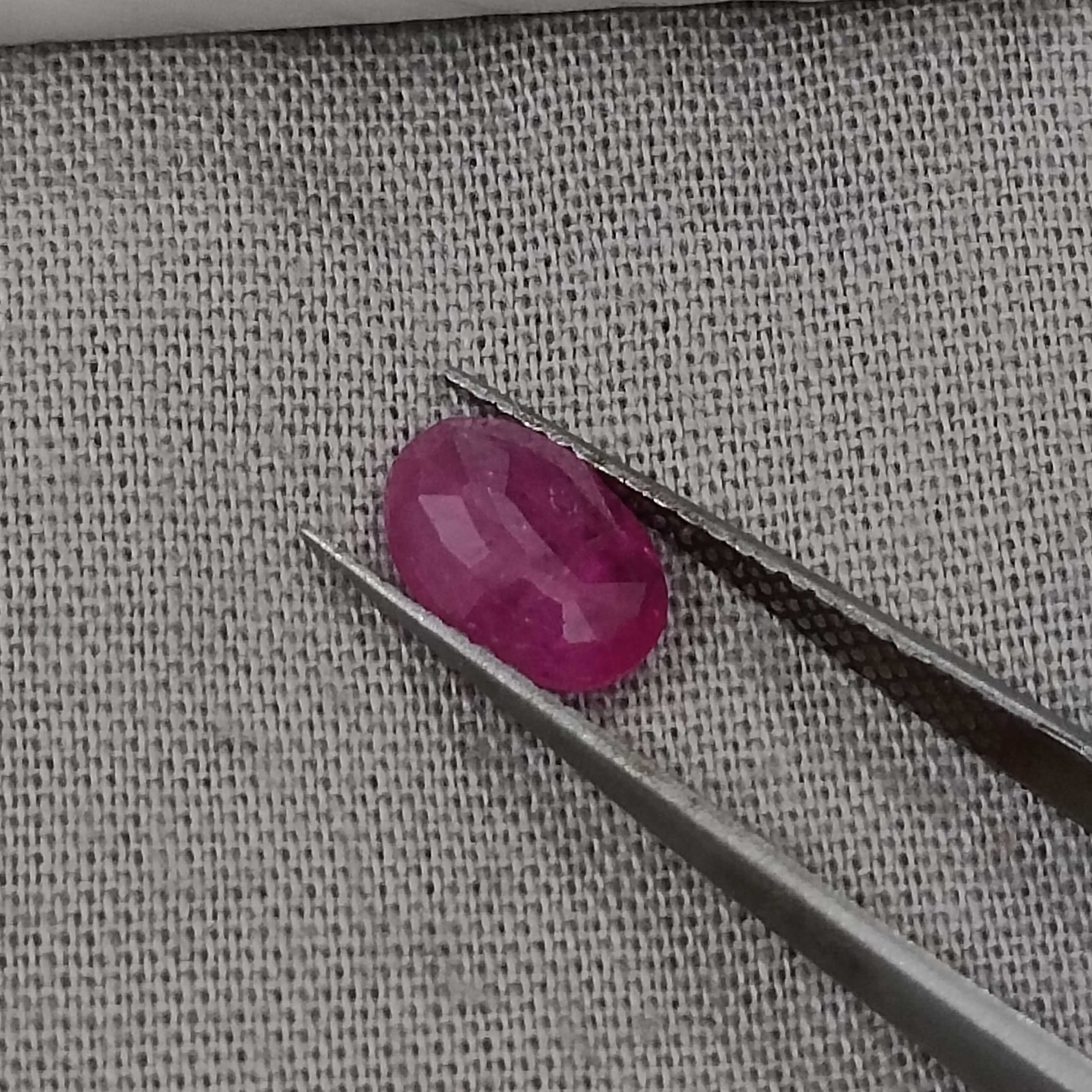 1.26cts GSI certified pinkish red oval cut unheated ruby 