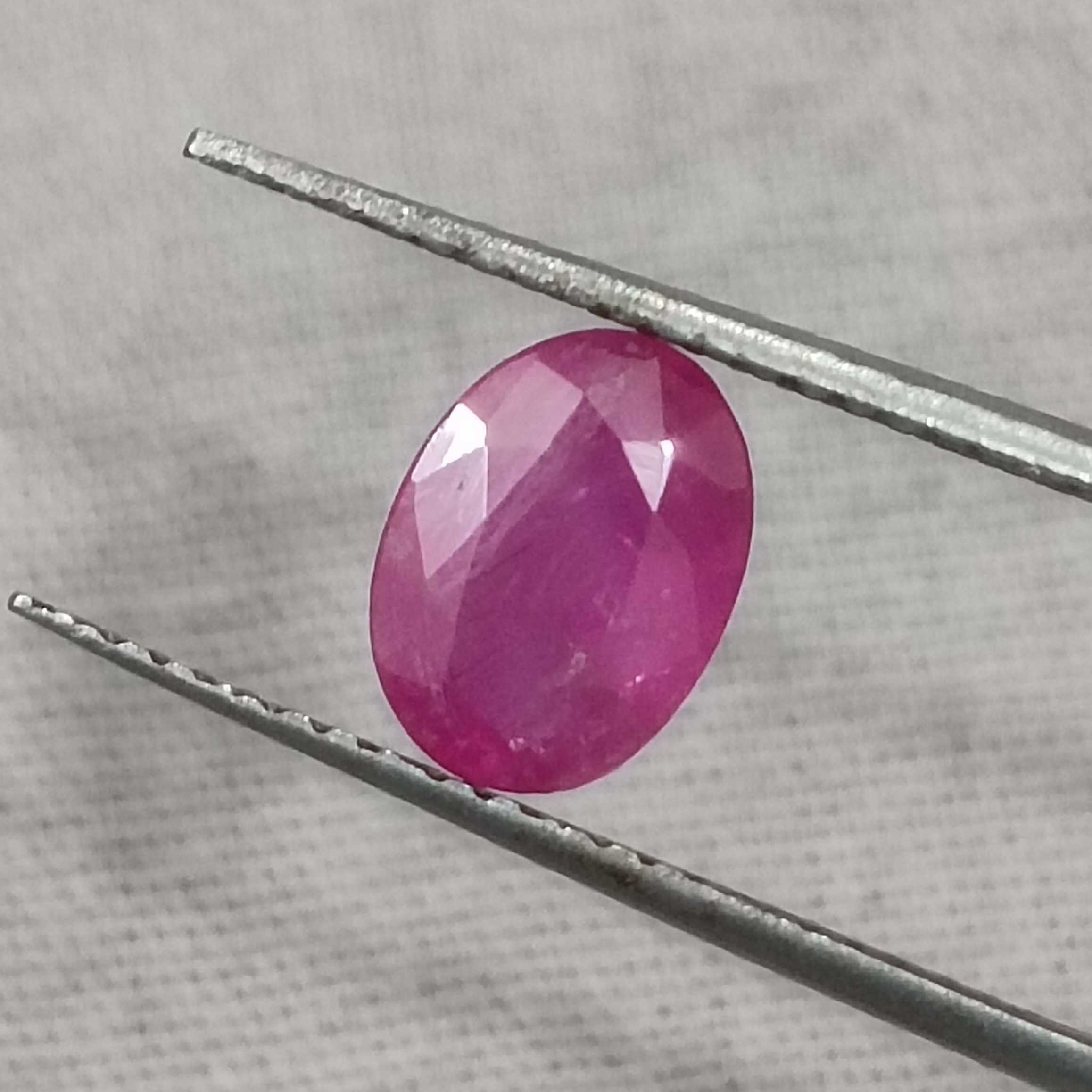 1.32cts certified glossy pinkish red transparent oval cut unheated African ruby gem/