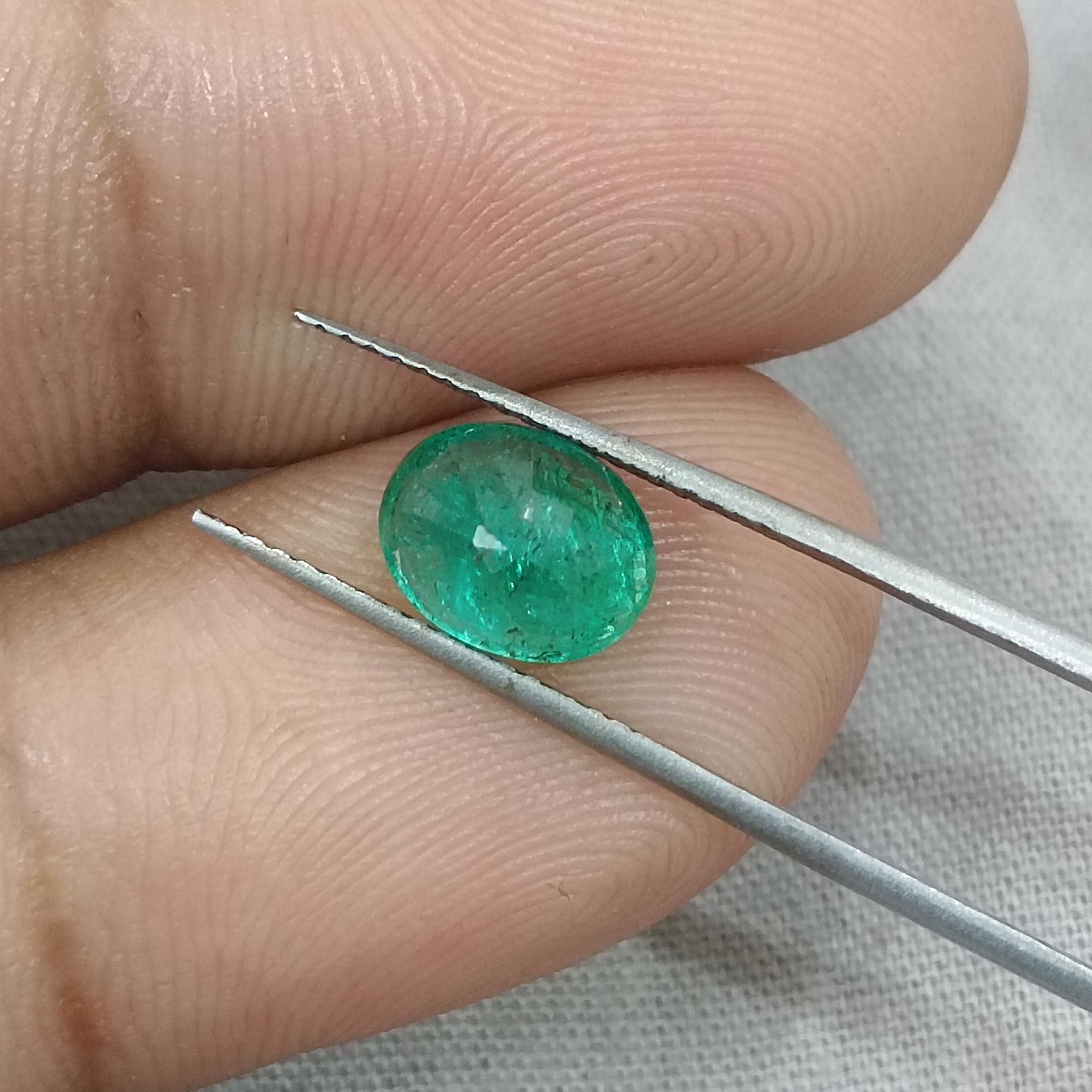 1.64ct medium deep green oval shaped Zambia origin emerald 