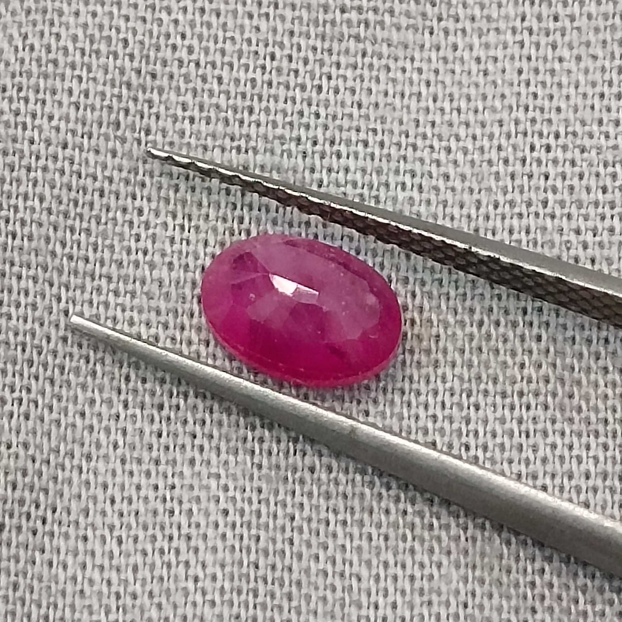 1.00ct certified pinkish red oval cut unheated ruby 